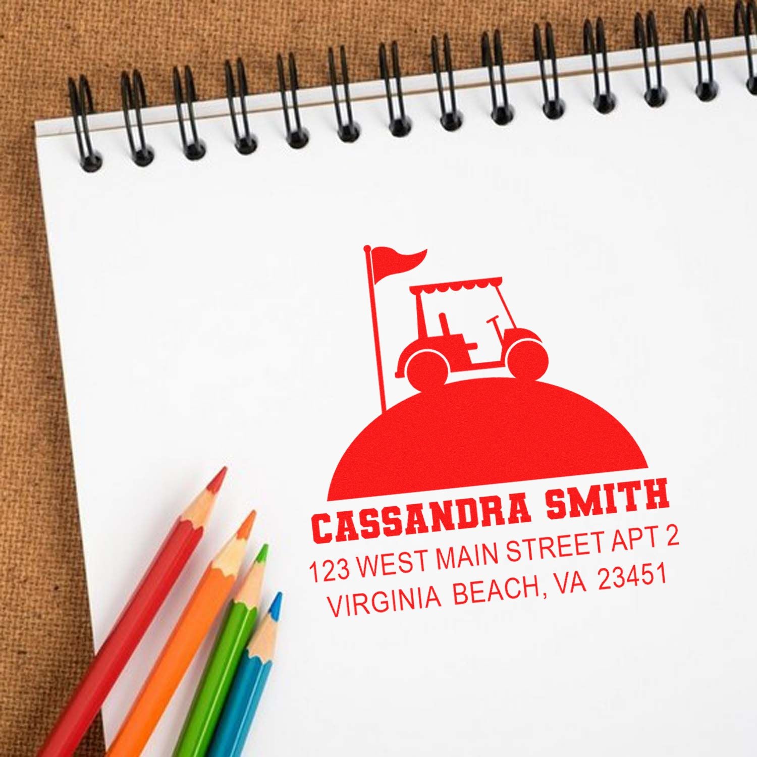 Custom rubber address stamp with tractor logo for Cassandra Smith, showing name and Virginia Beach mailing address.