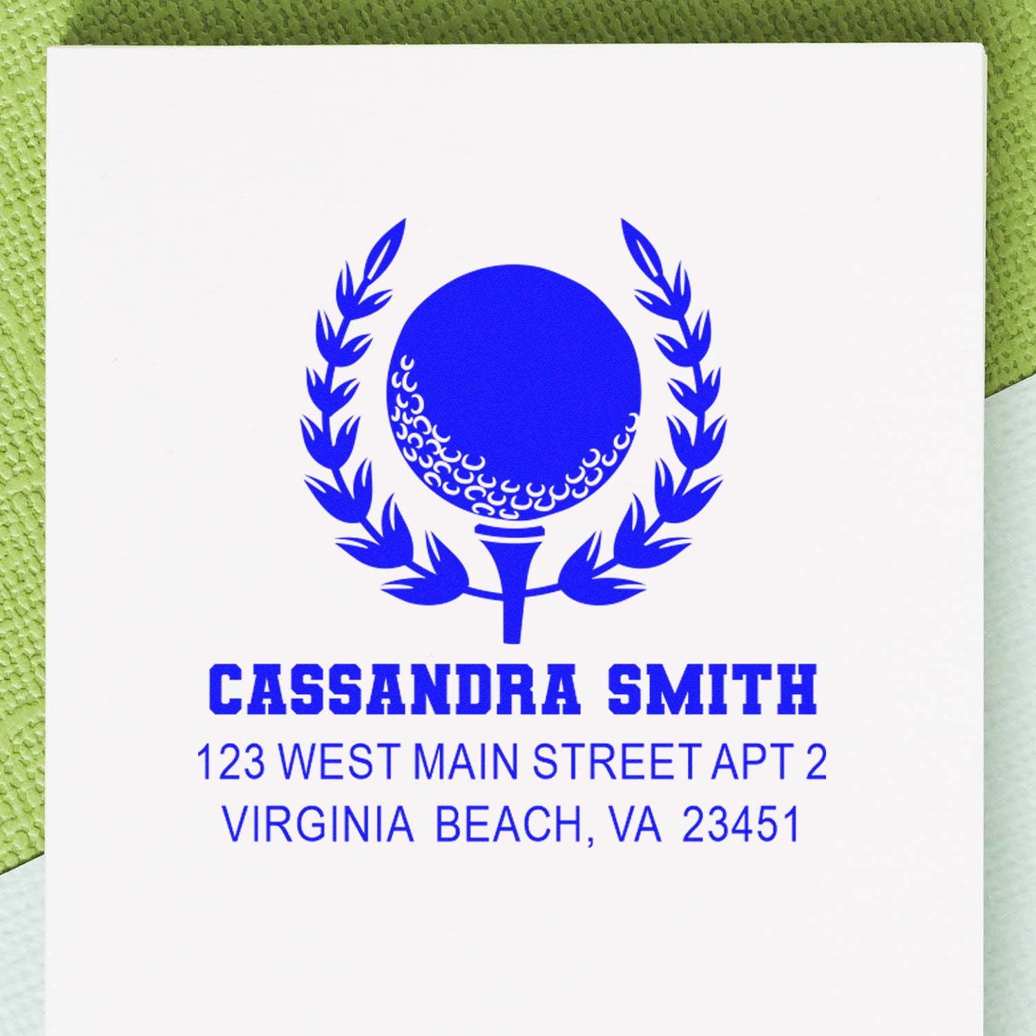 Custom golf-themed return address rubber stamp for Cassandra Smith, 123 West Main Street Apt 2, Virginia Beach, VA 23451.