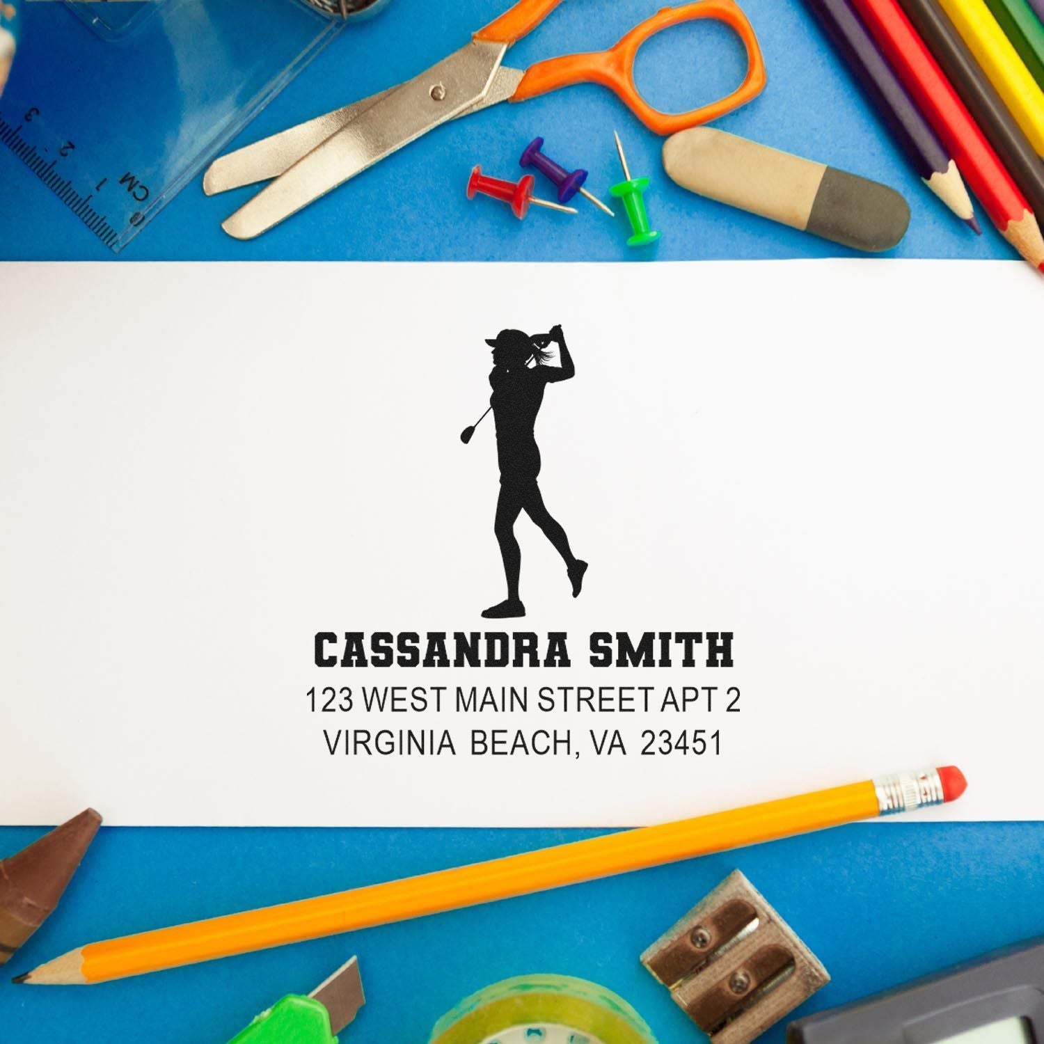 Custom golf address rubber stamp for envelopes, featuring a golfer silhouette, name, and mailing address.