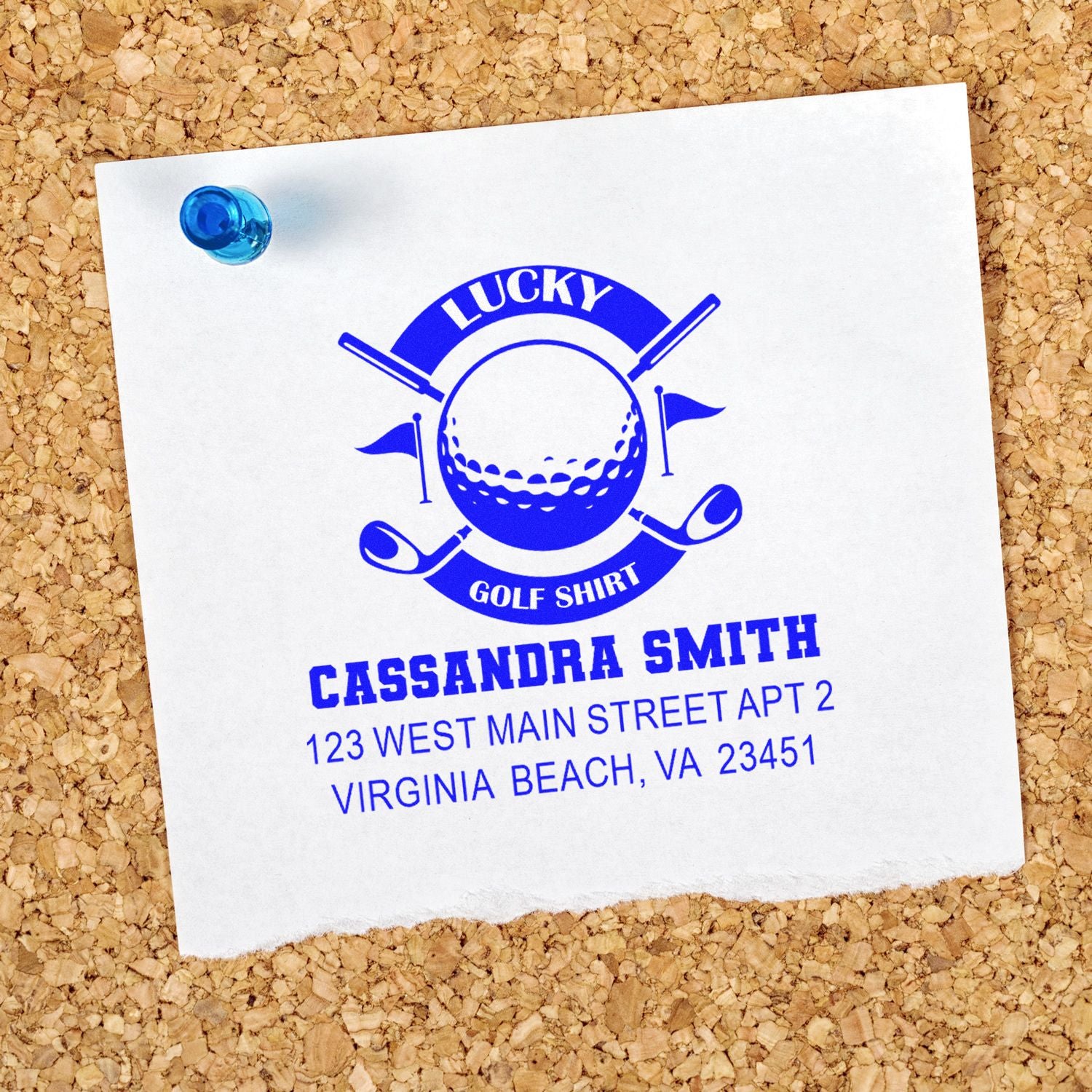 Golf-themed custom rubber stamp with name and address, featuring a blue Lucky Golf Shirt design on pinned paper.