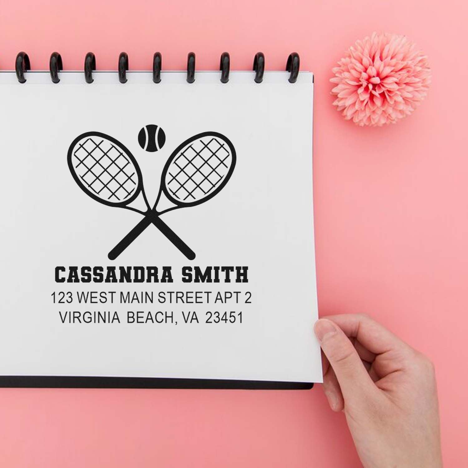 Custom tennis-themed rubber stamp with crossed rackets, personalized name, and address for mailing labels.