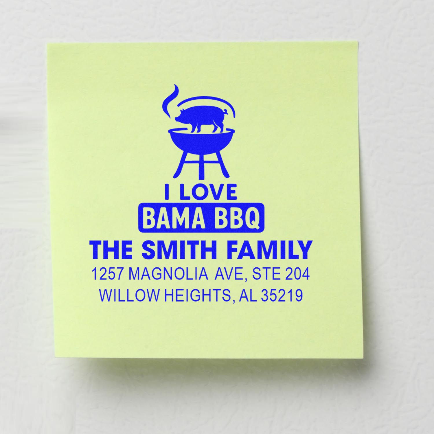 Custom address rubber stamp for The Smith Family, featuring pig grill logo and Bama BBQ return address in Willow Heights, AL.