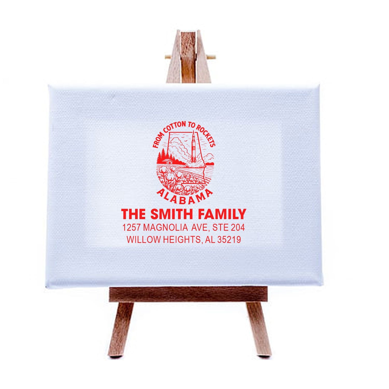 Custom return address rubber stamp for The Smith Family, Alabama, with rocket design and personalized address imprint.