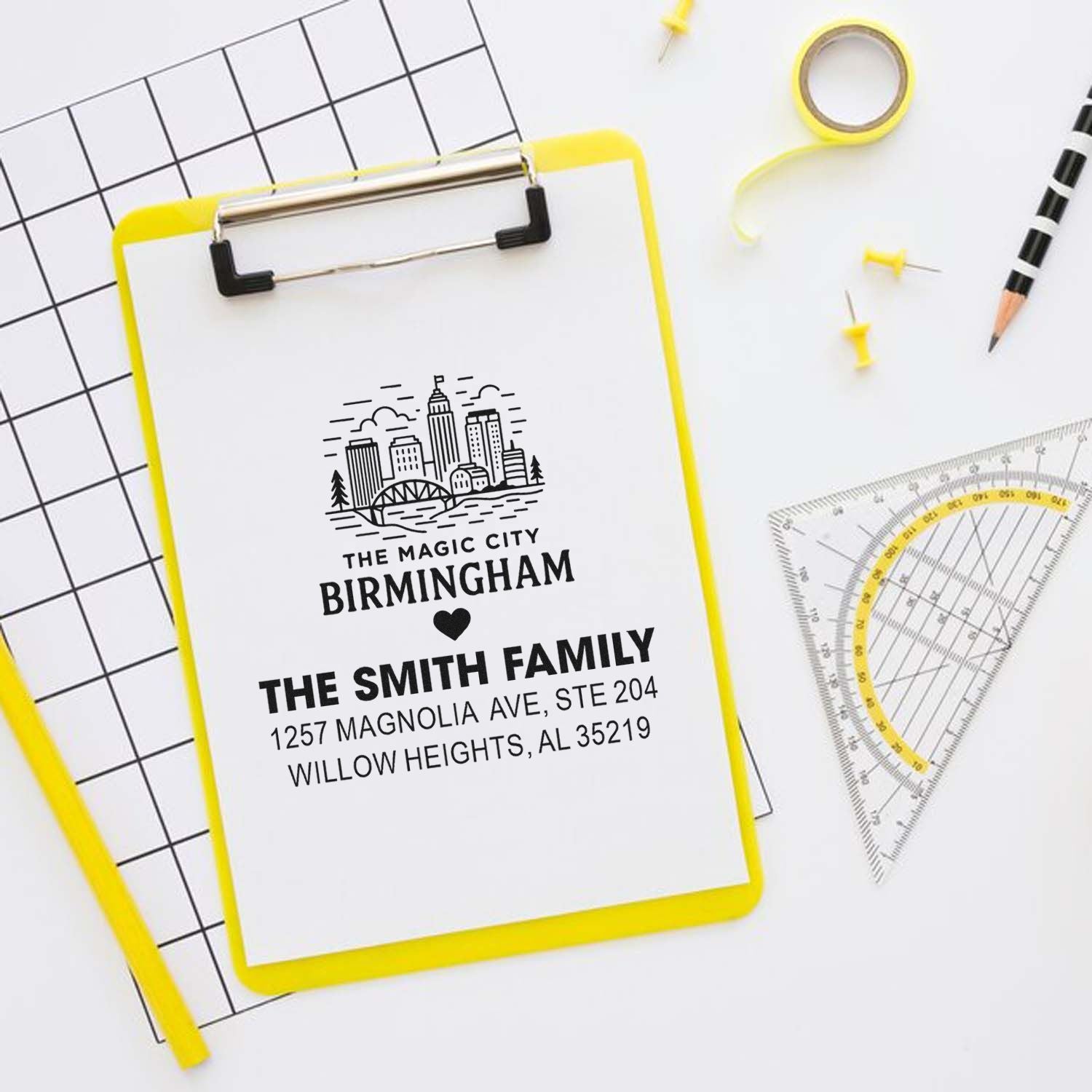 Custom rubber address stamp featuring Birmingham skyline and The Smith Family name for personalized stationery.