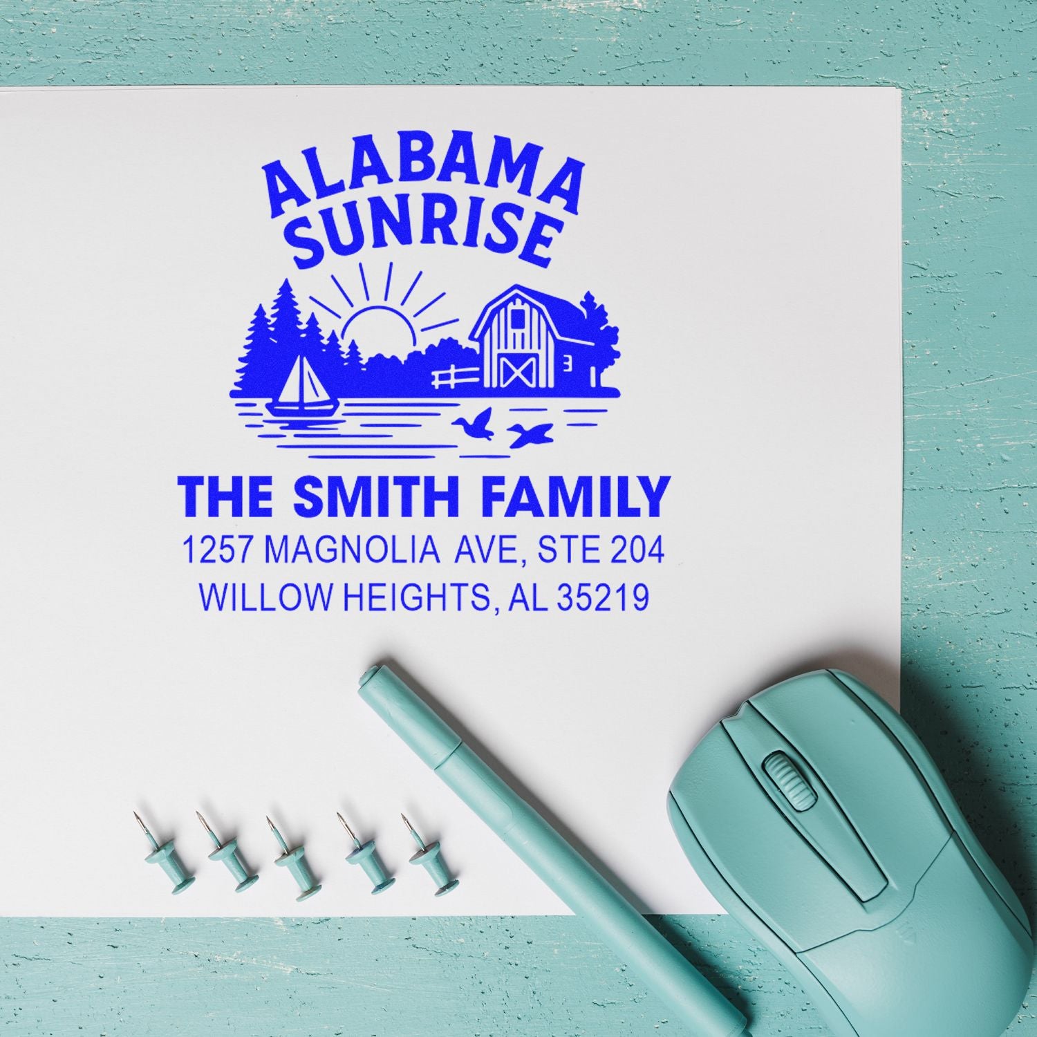 Custom rubber address stamp featuring Alabama Sunrise design for The Smith Family with Willow Heights, AL return address.