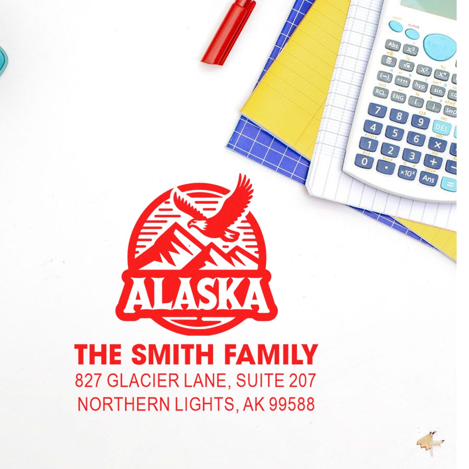Custom Alaska return address rubber stamp for The Smith Family with eagle mountain logo and mailing address.