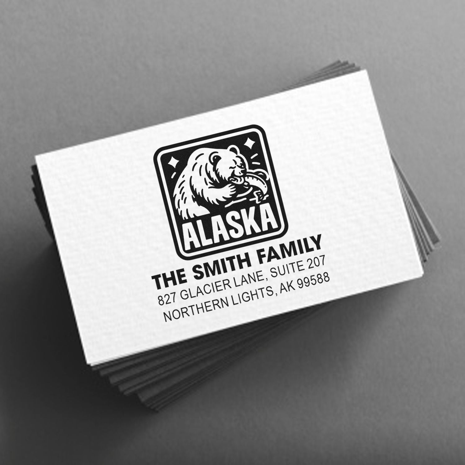 Custom Alaska rubber stamp with bear logo and The Smith Family return address design for personalized mailing.