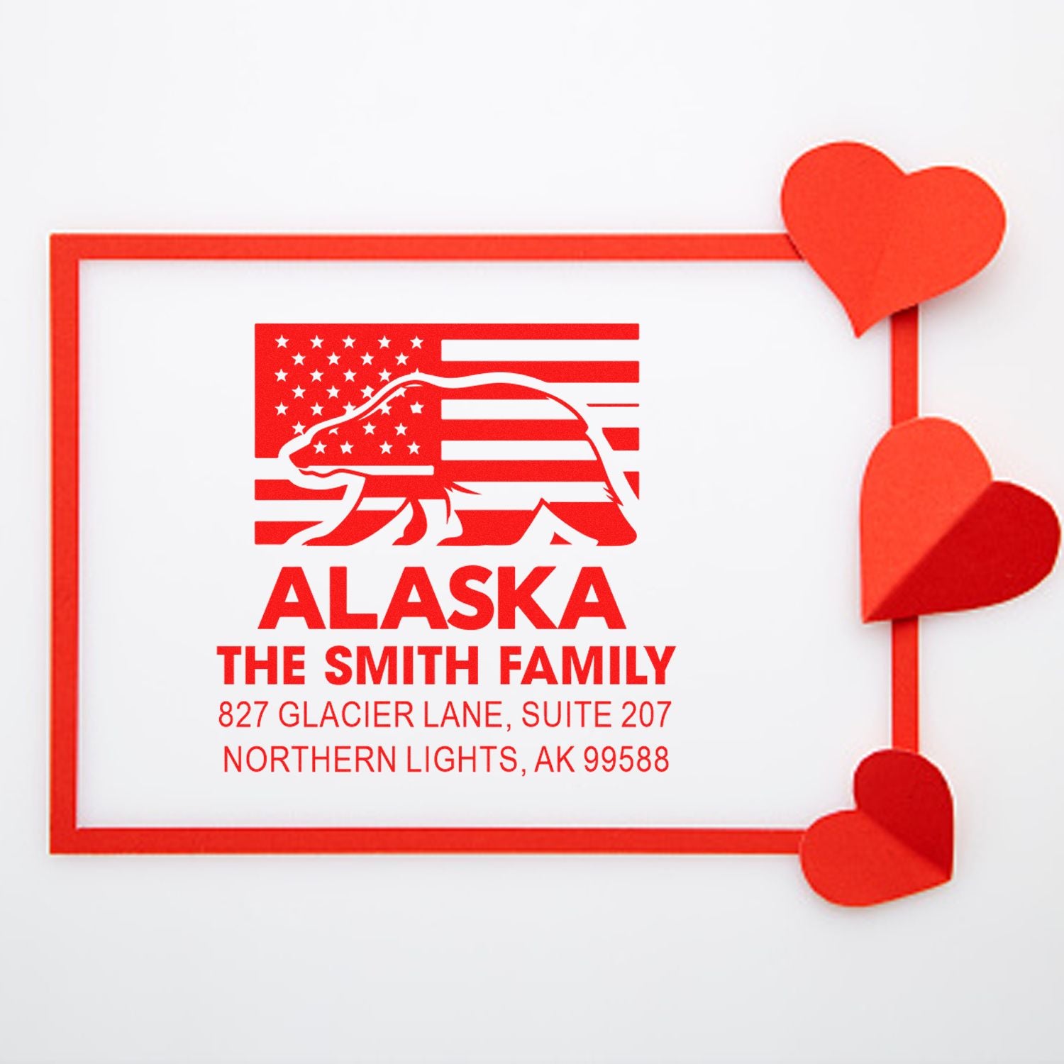 Custom Alaska return address rubber stamp with bear flag design, Smith family name, and heart accents.