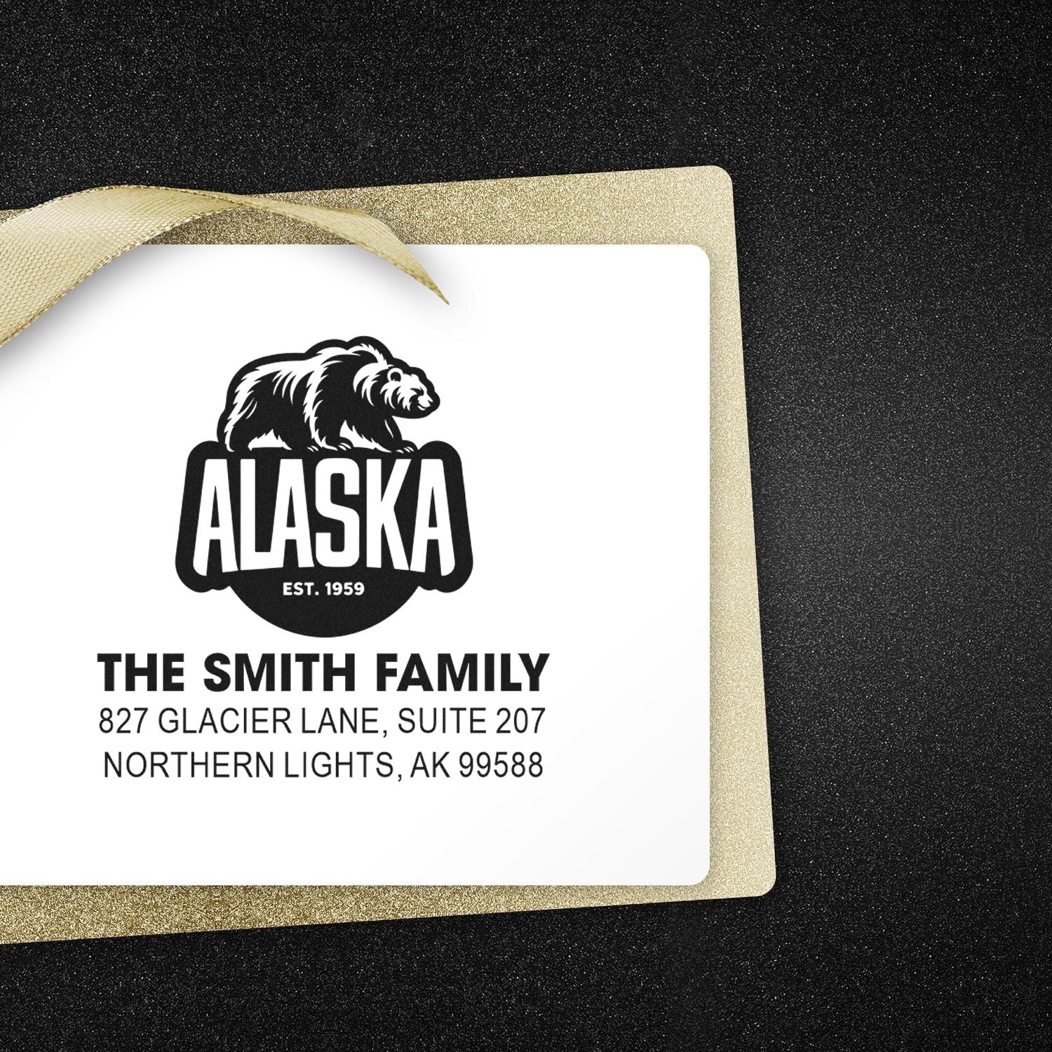 Custom Alaska family return address rubber stamp with bear logo, The Smith Family name, and Northern Lights, AK address.
