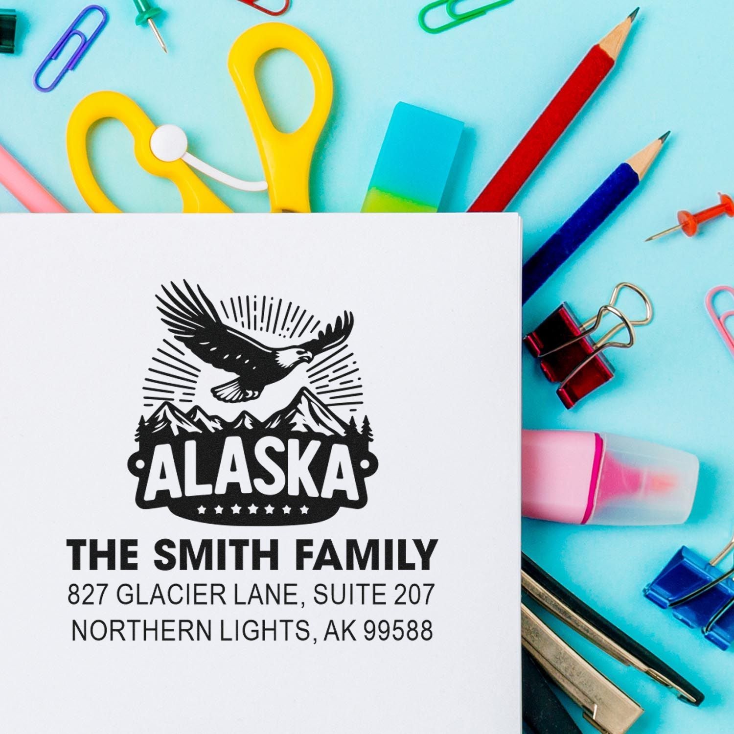 Personalized Alaska return address rubber stamp with eagle and mountain design for The Smith Family.