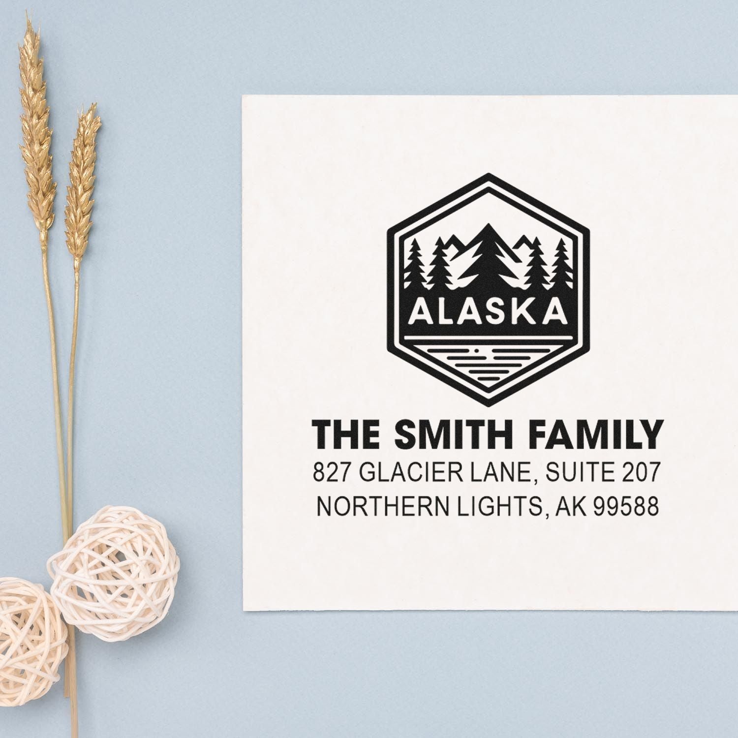 Personalized Alaska return address rubber stamp with mountain logo for The Smith Family, Northern Lights, AK 99588