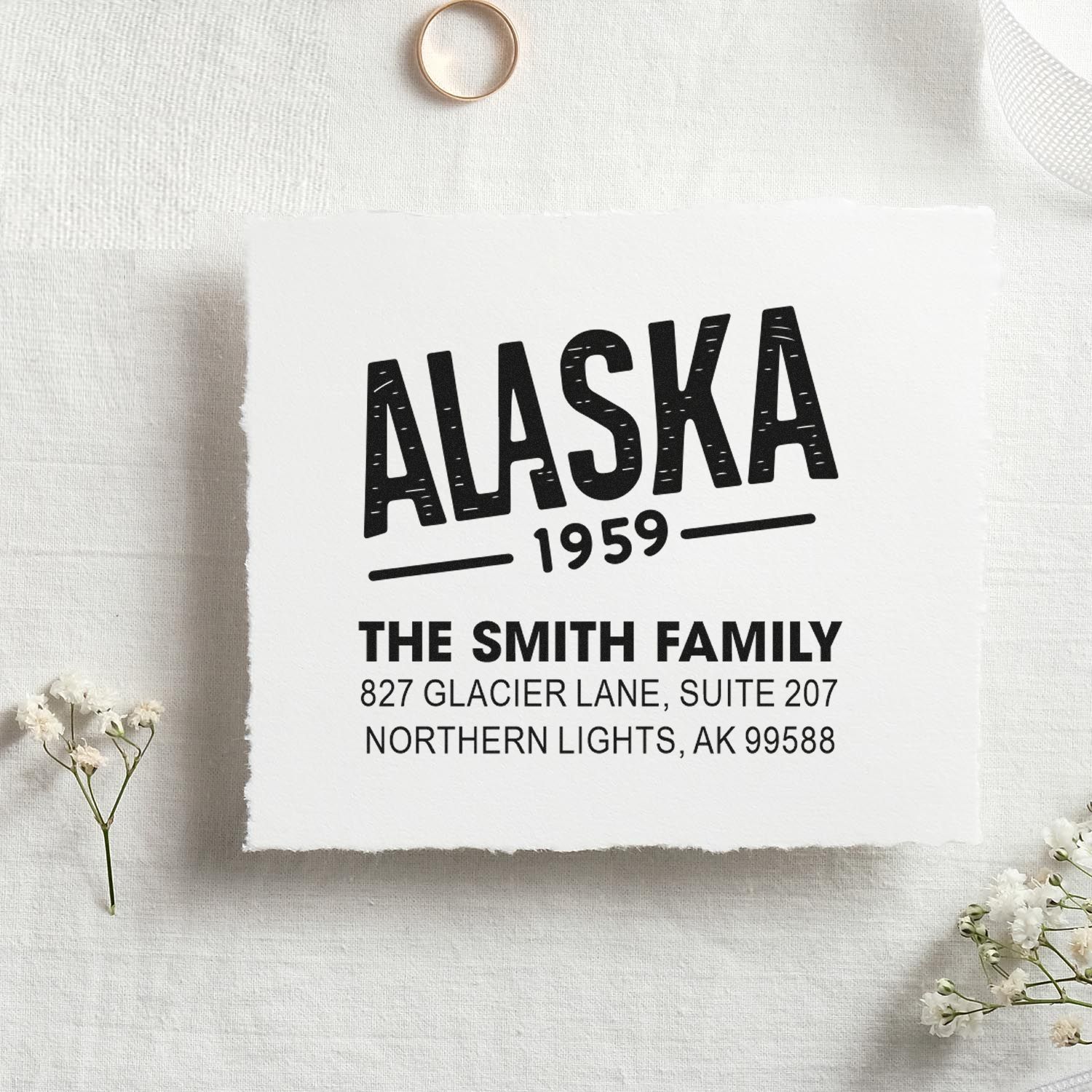 Personalized Alaska return address rubber stamp with family name, 1959 est., and Northern Lights, AK address.