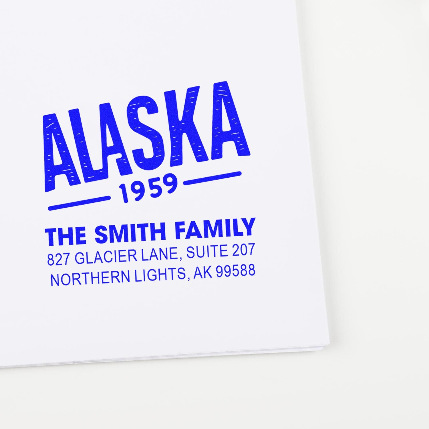 Custom Alaska return address rubber stamp for The Smith Family, with 1959 and Northern Lights, AK 99588.