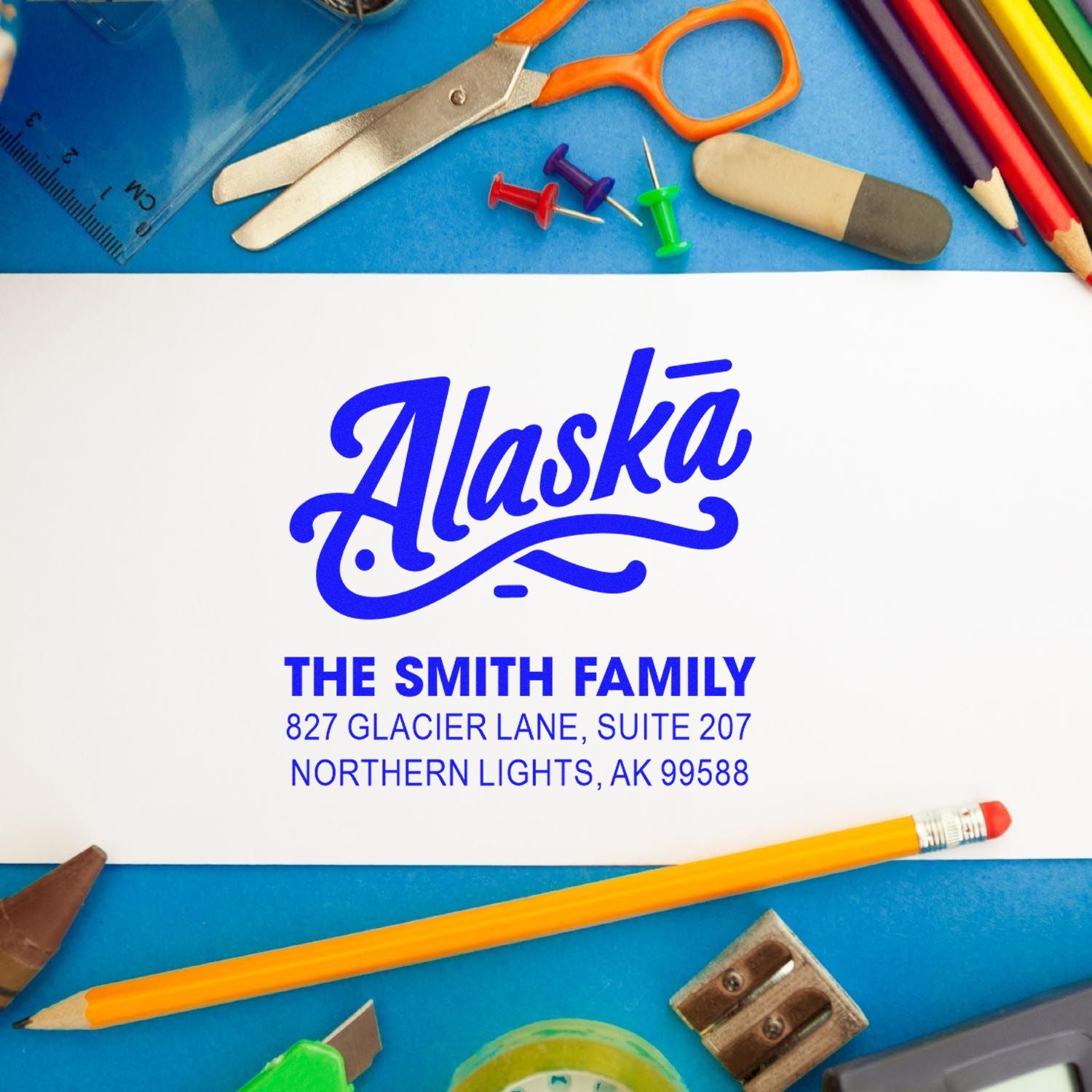 Custom Alaska return address rubber stamp for The Smith Family with name and address for mailing and stationery.
