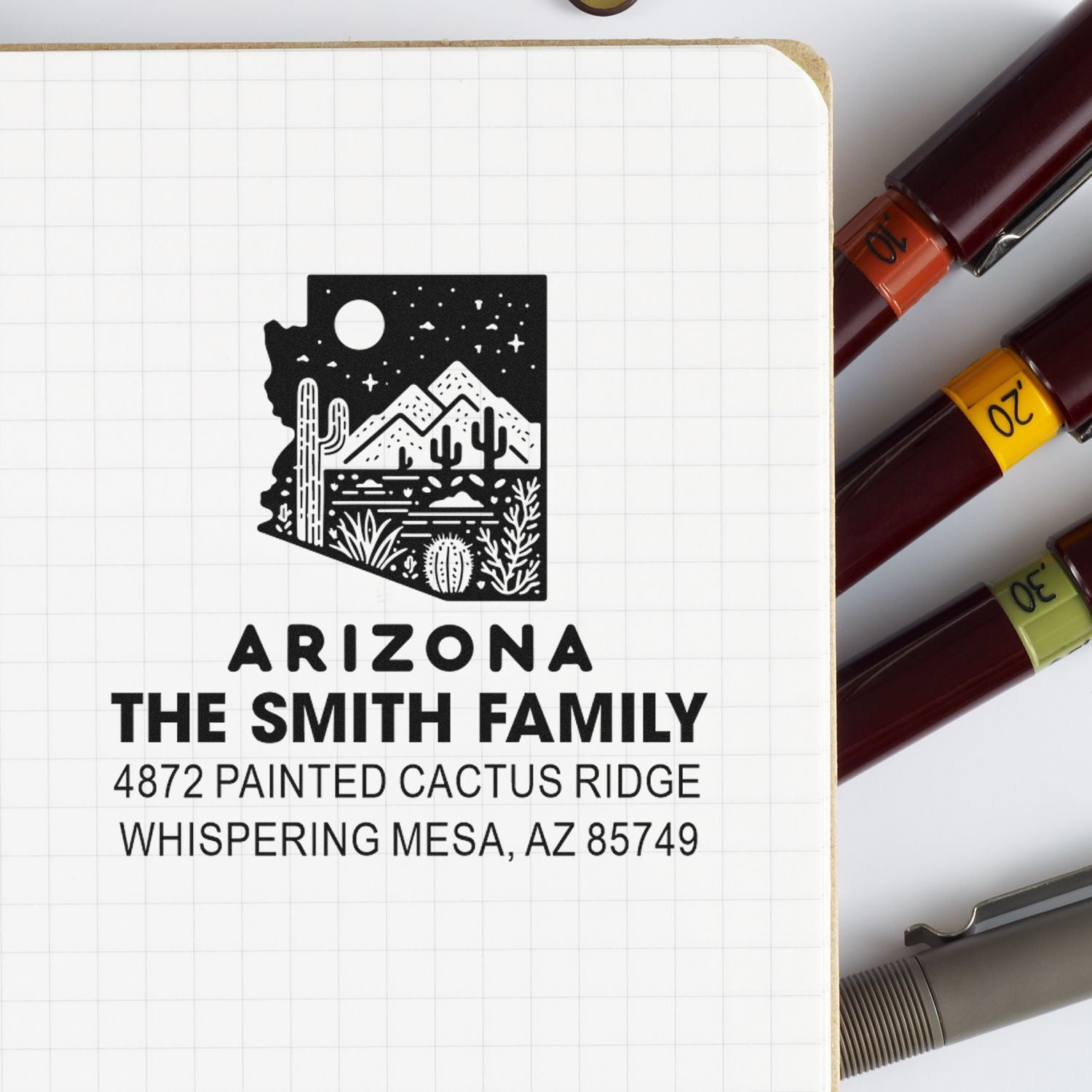 Personalized Arizona return address rubber stamp for The Smith Family with desert state design and custom mailing address.