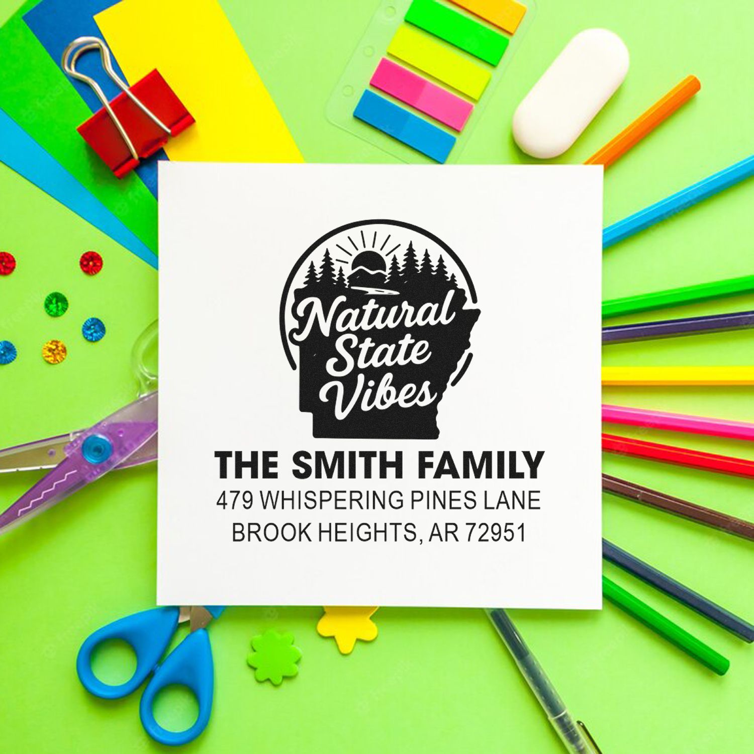 Custom return address rubber stamp with Natural State Vibes design and Smith Family address.