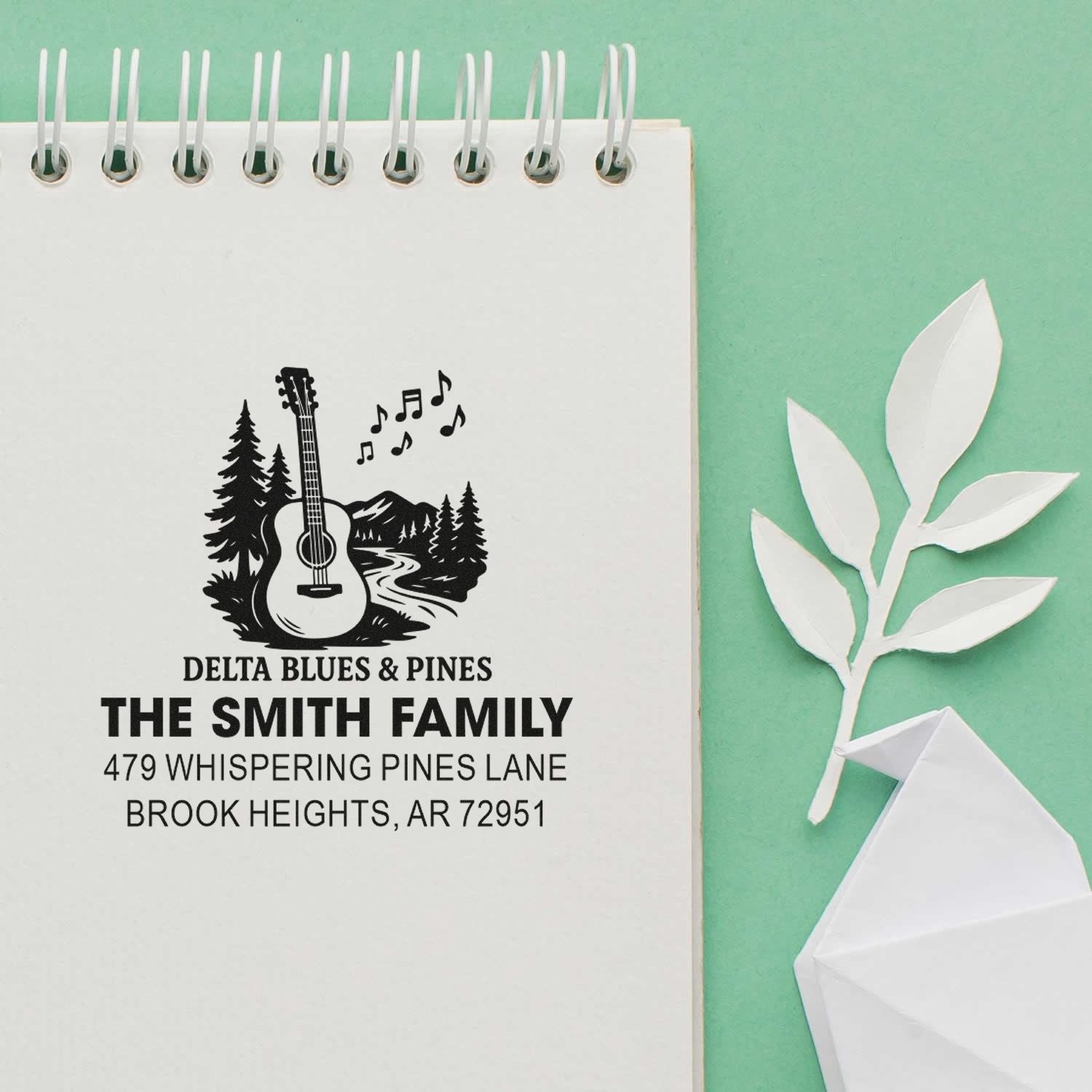 Custom rubber address stamp for The Smith Family with guitar and pine tree design, ideal for personalized mail and stationery.