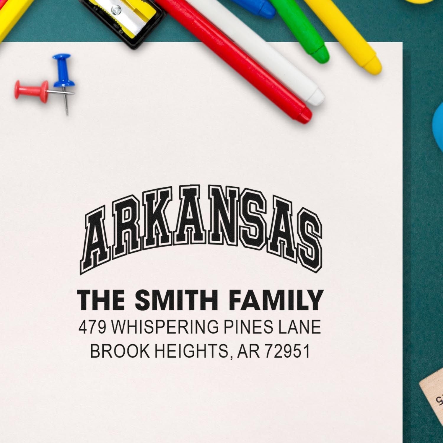 Personalized Arkansas return address rubber stamp for The Smith Family with full mailing address.