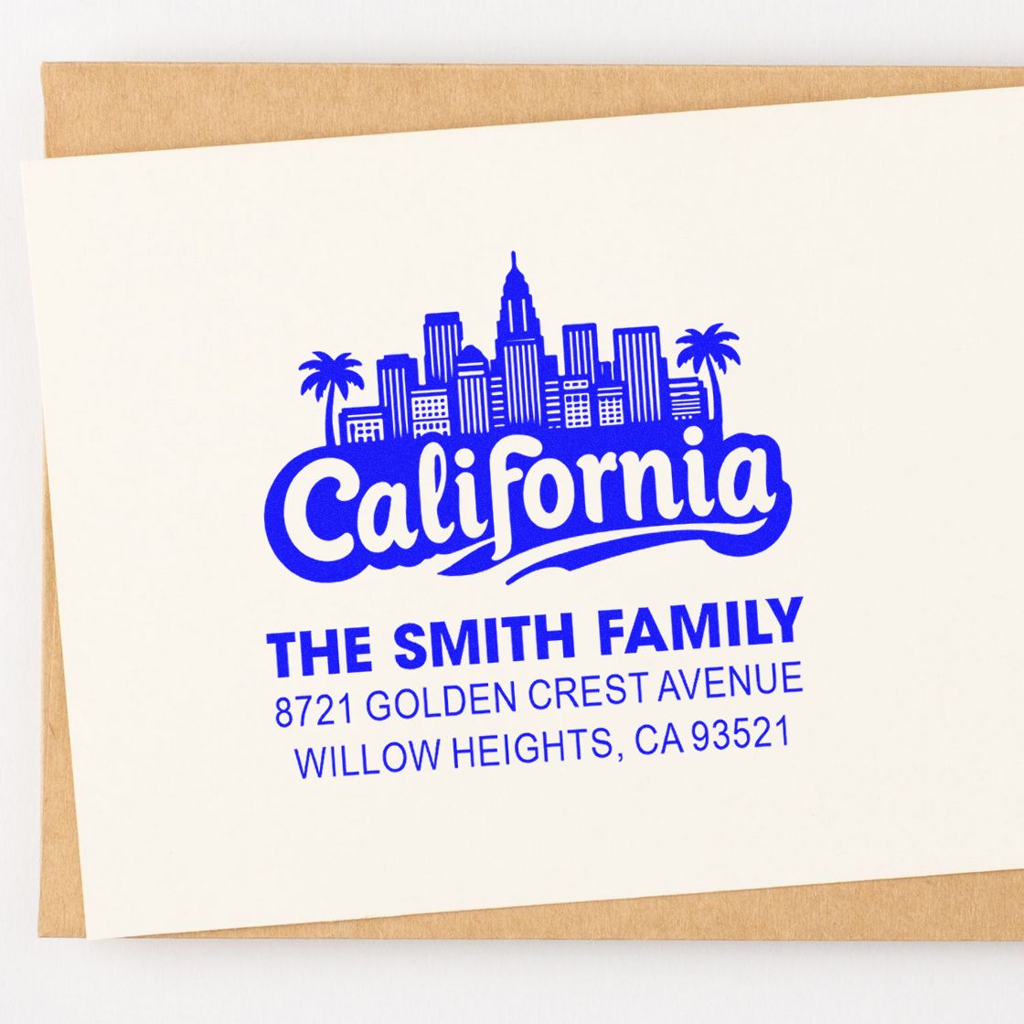 Custom California return address rubber stamp with city skyline, palm trees, and The Smith Family name.
