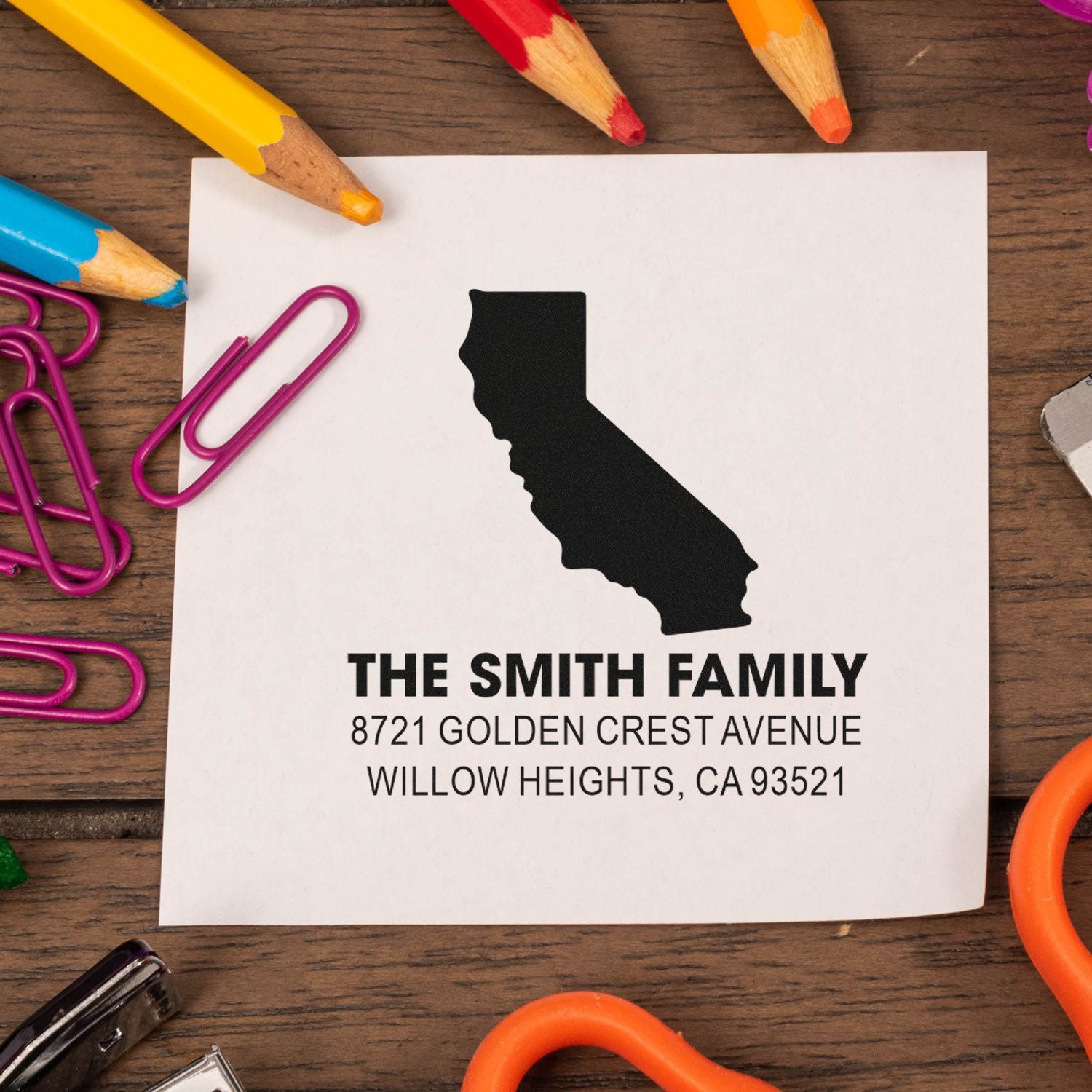Custom rubber address stamp with California silhouette for personalized family mailing and return envelopes.