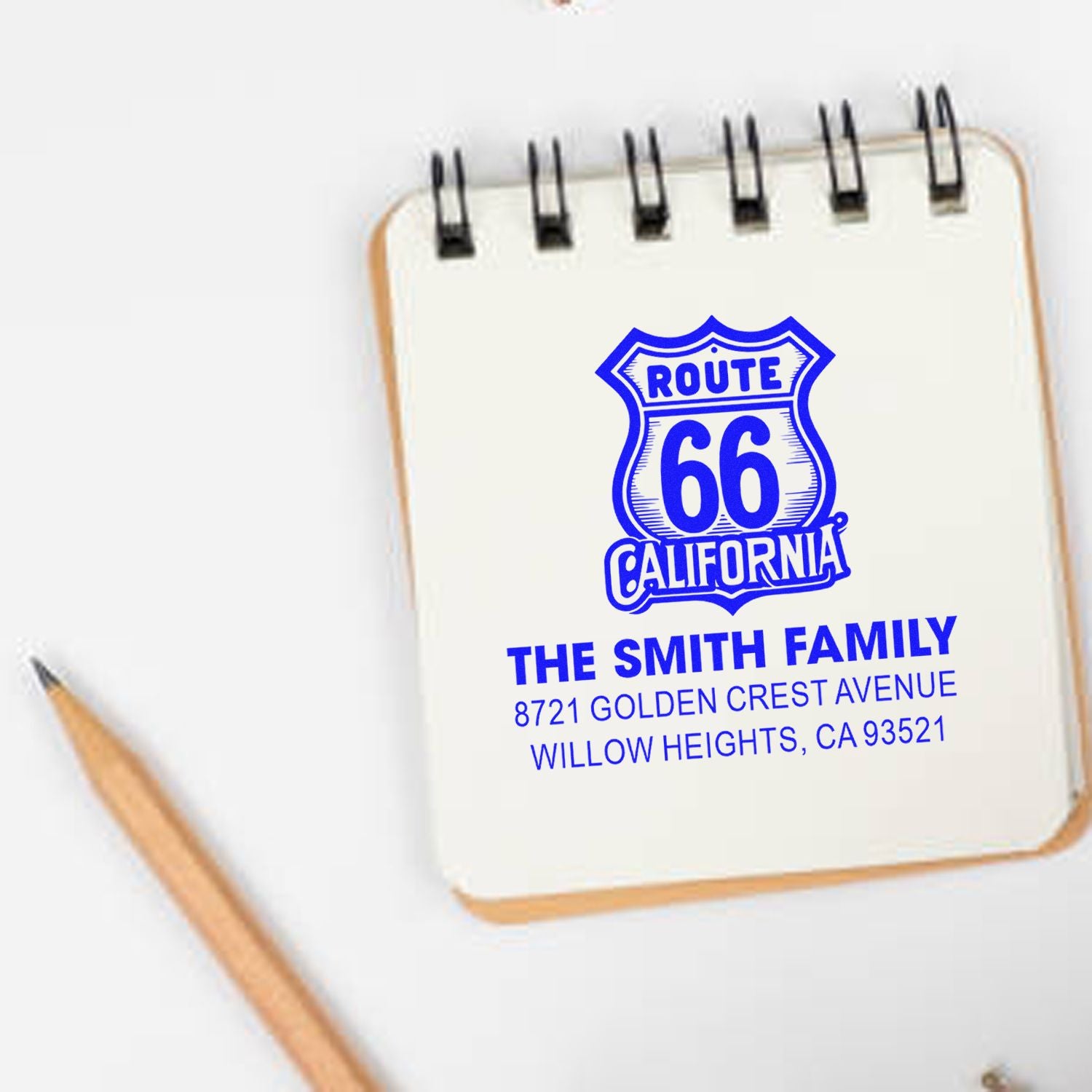 Custom Route 66 California address rubber stamp with family name, city, state, and ZIP code for mailing.