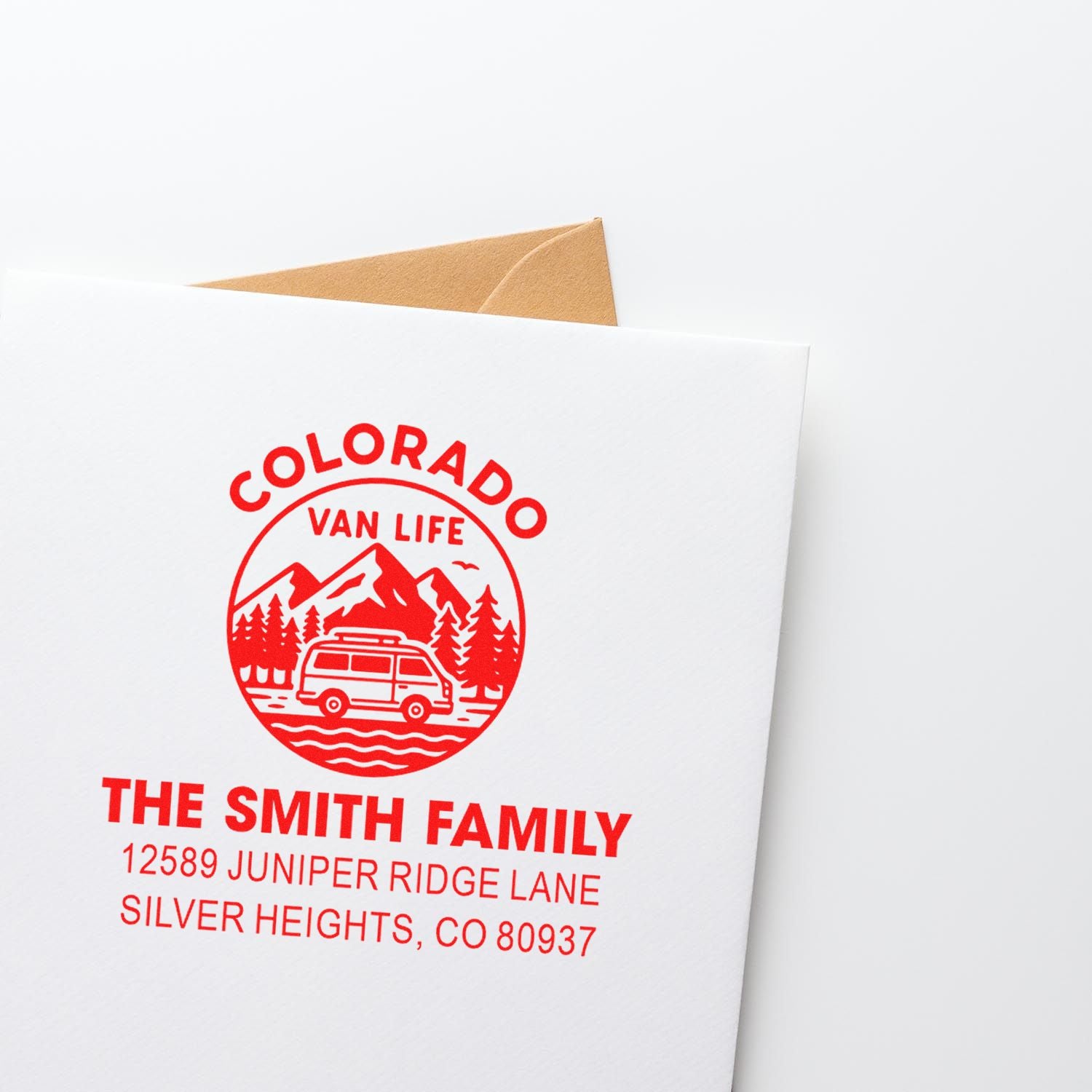 Custom return address rubber stamp for envelopes, featuring a Colorado van life design for The Smith Family in Silver Heights, CO.