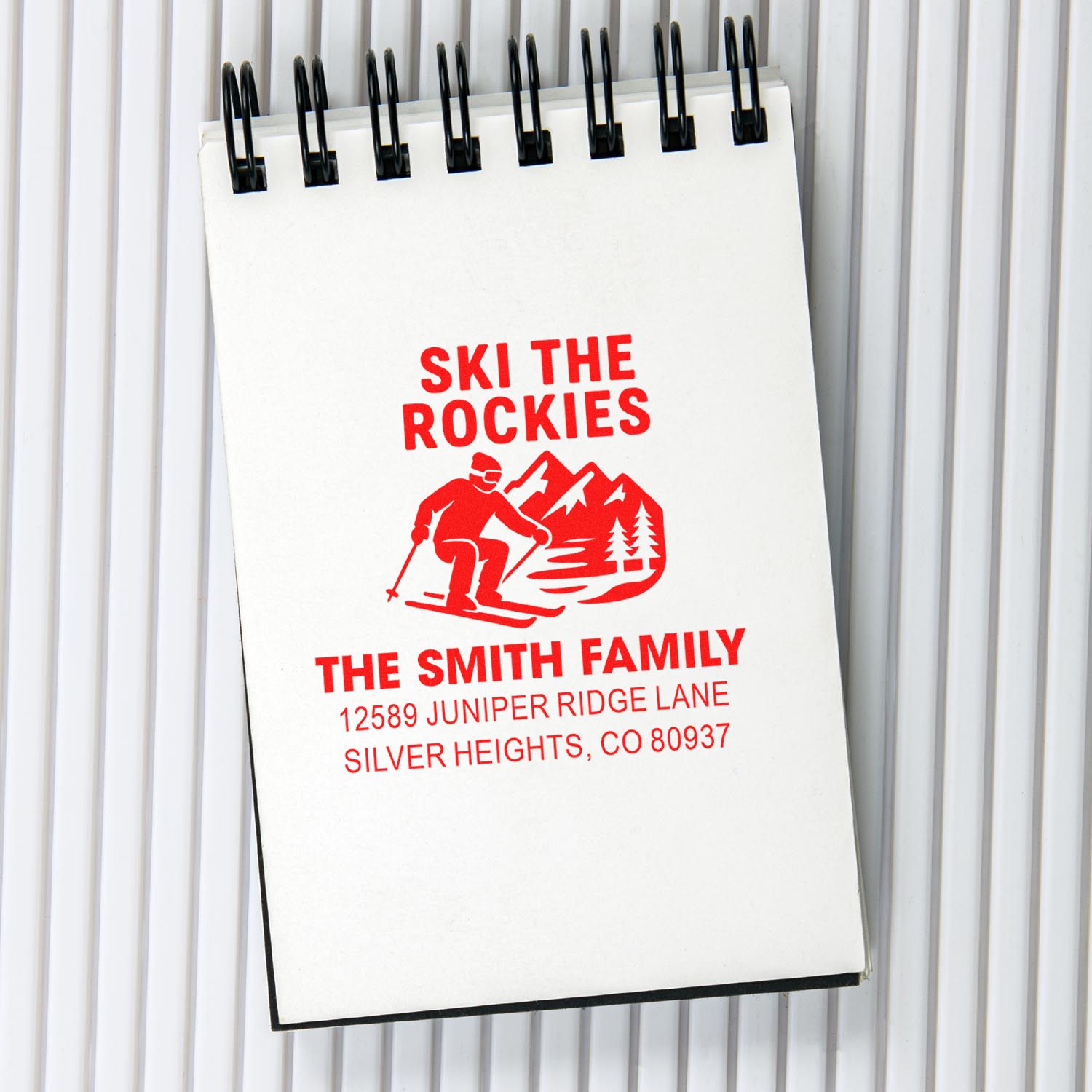 Custom return address rubber stamp with Ski the Rockies design for the Smith family.