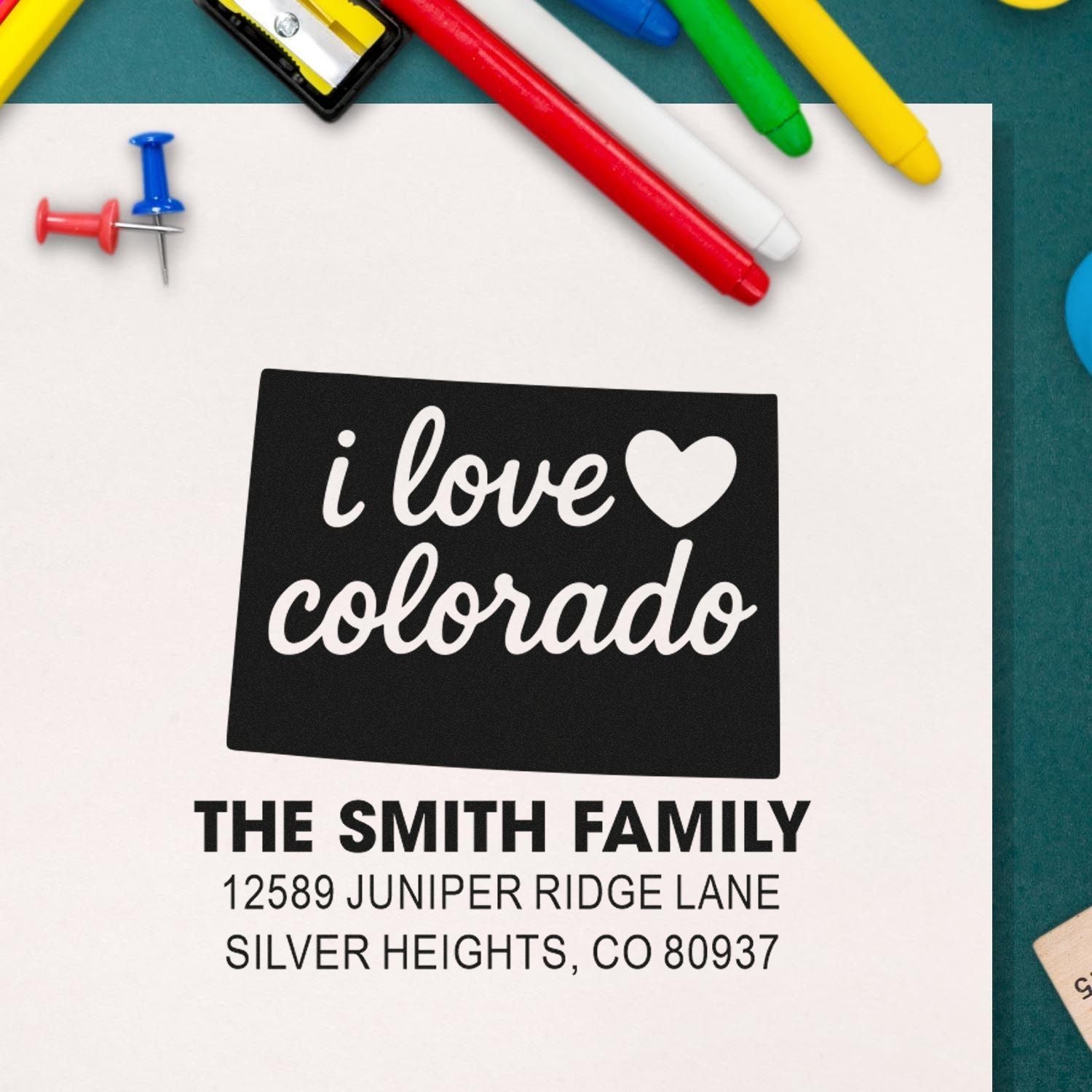 Custom rubber return address stamp with I love Colorado design for the Smith family in Silver Heights, CO.