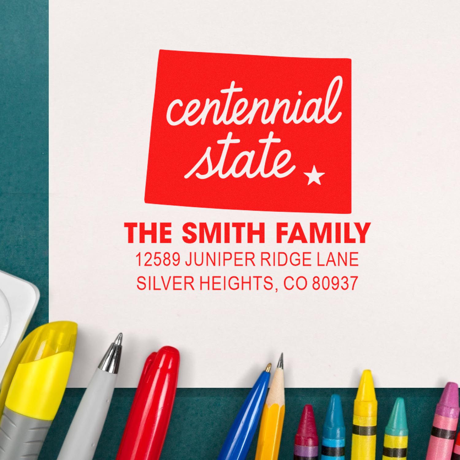 Custom rubber return address stamp for The Smith Family, featuring Centennial State design and Silver Heights, CO.