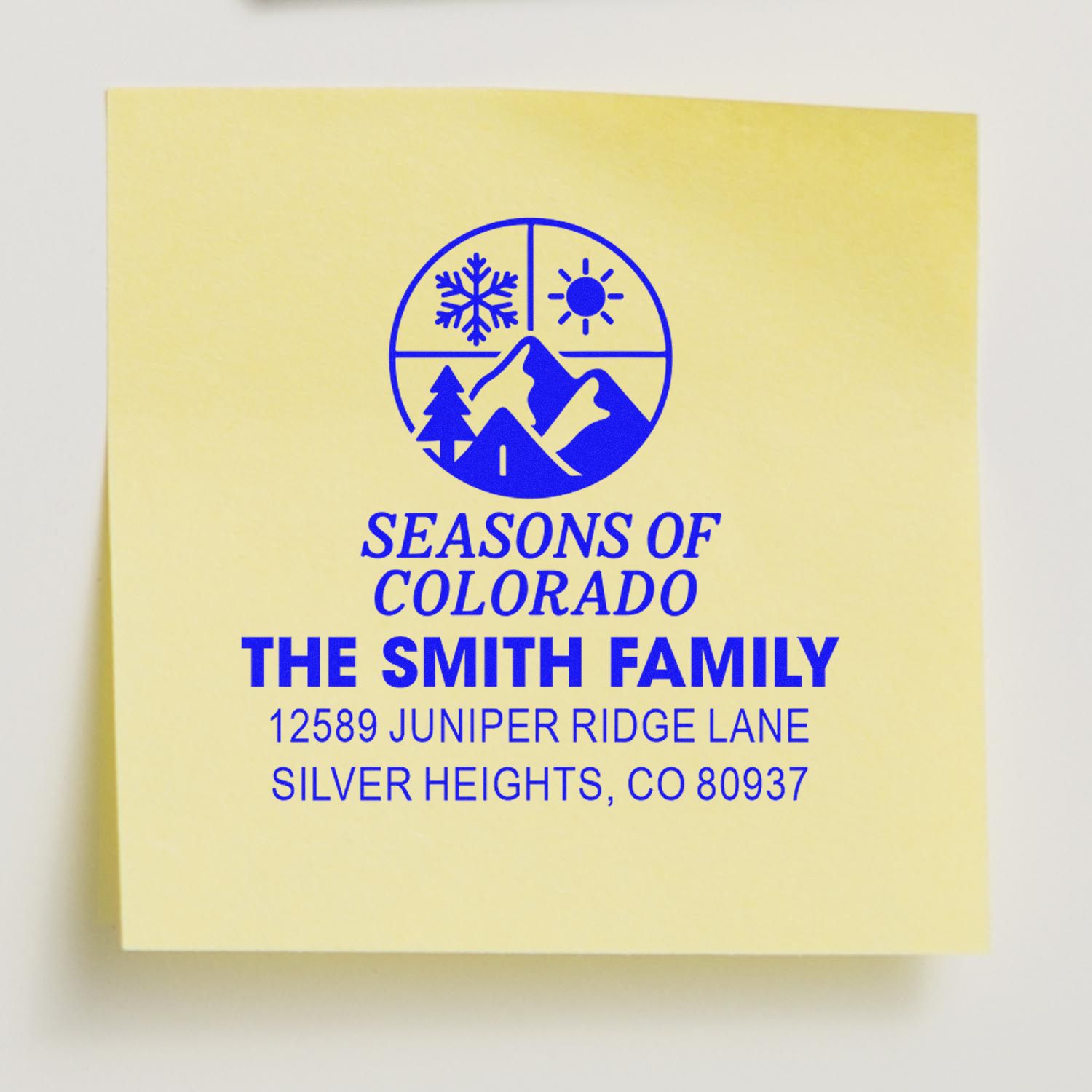 Personalized return address rubber stamp with Seasons of Colorado logo for The Smith Family in Silver Heights, Colorado.