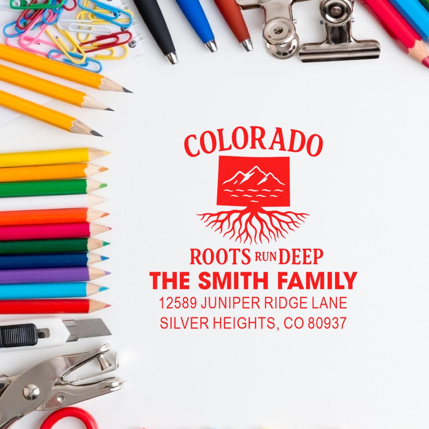 Personalized rubber stamp impression with Colorado roots design and The Smith Family return address.
