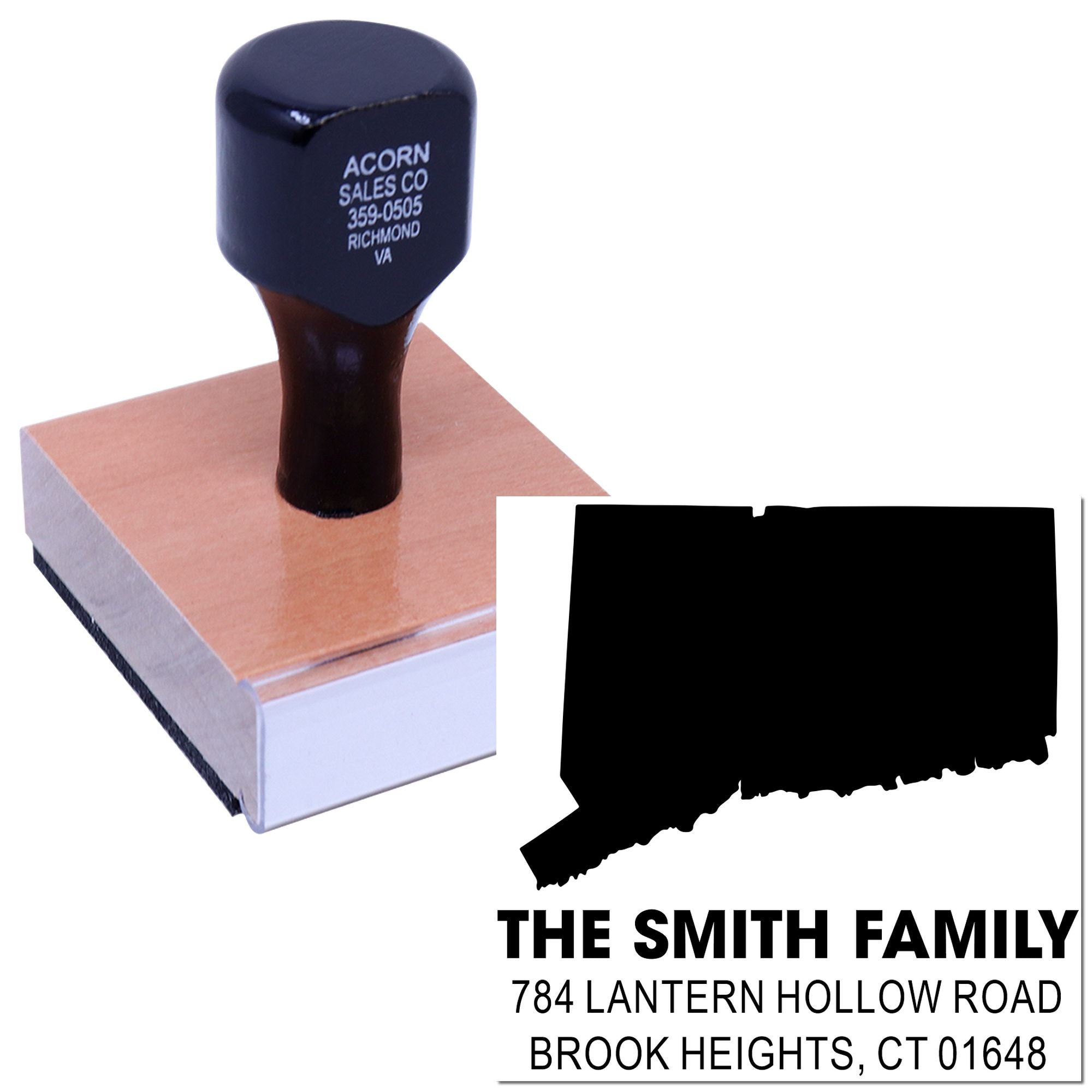Custom rubber address stamp with personalized family name and return address, featuring state silhouette for mailing and labeling.