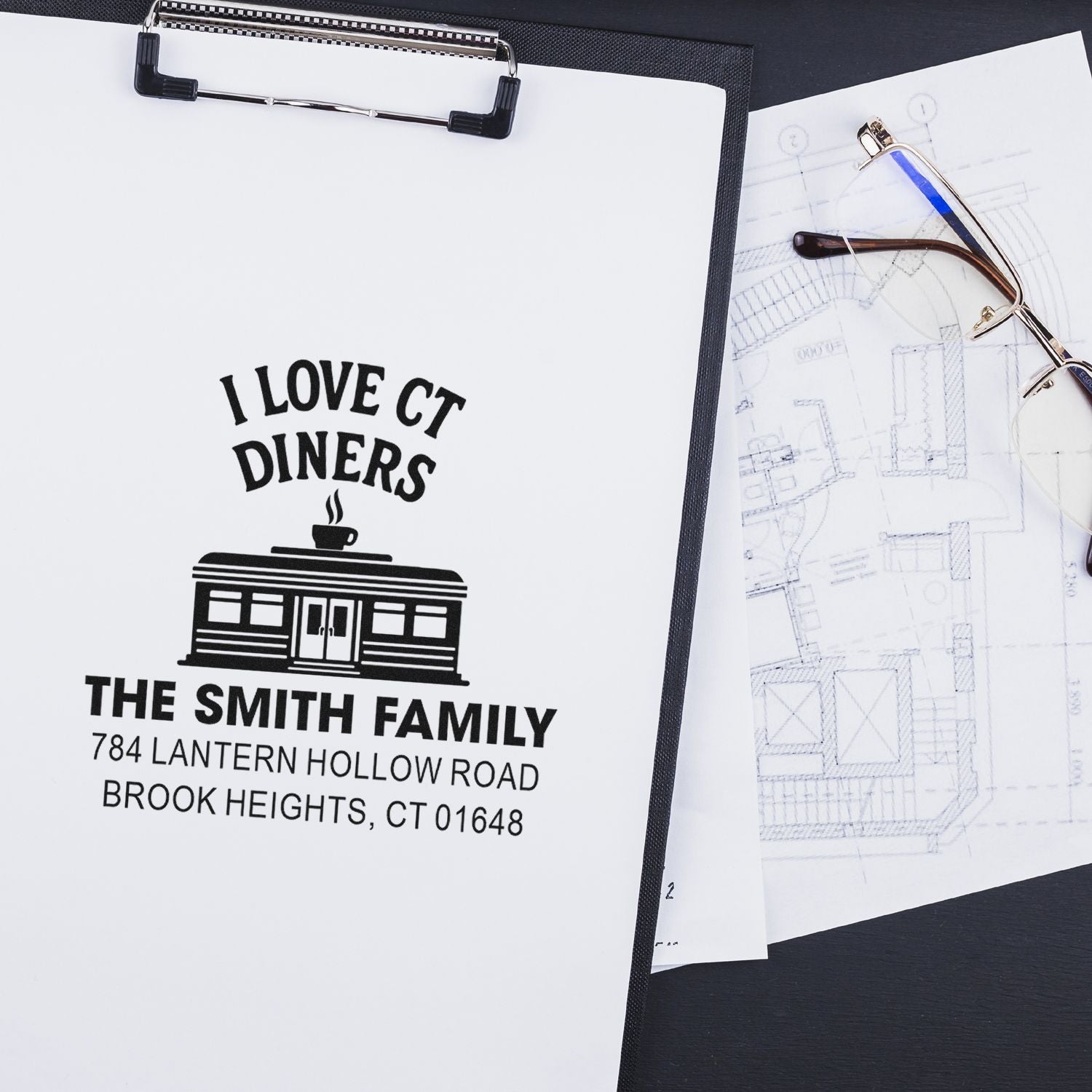 Custom rubber address stamp for The Smith Family diner, featuring logo, name, and return address for stationery.
