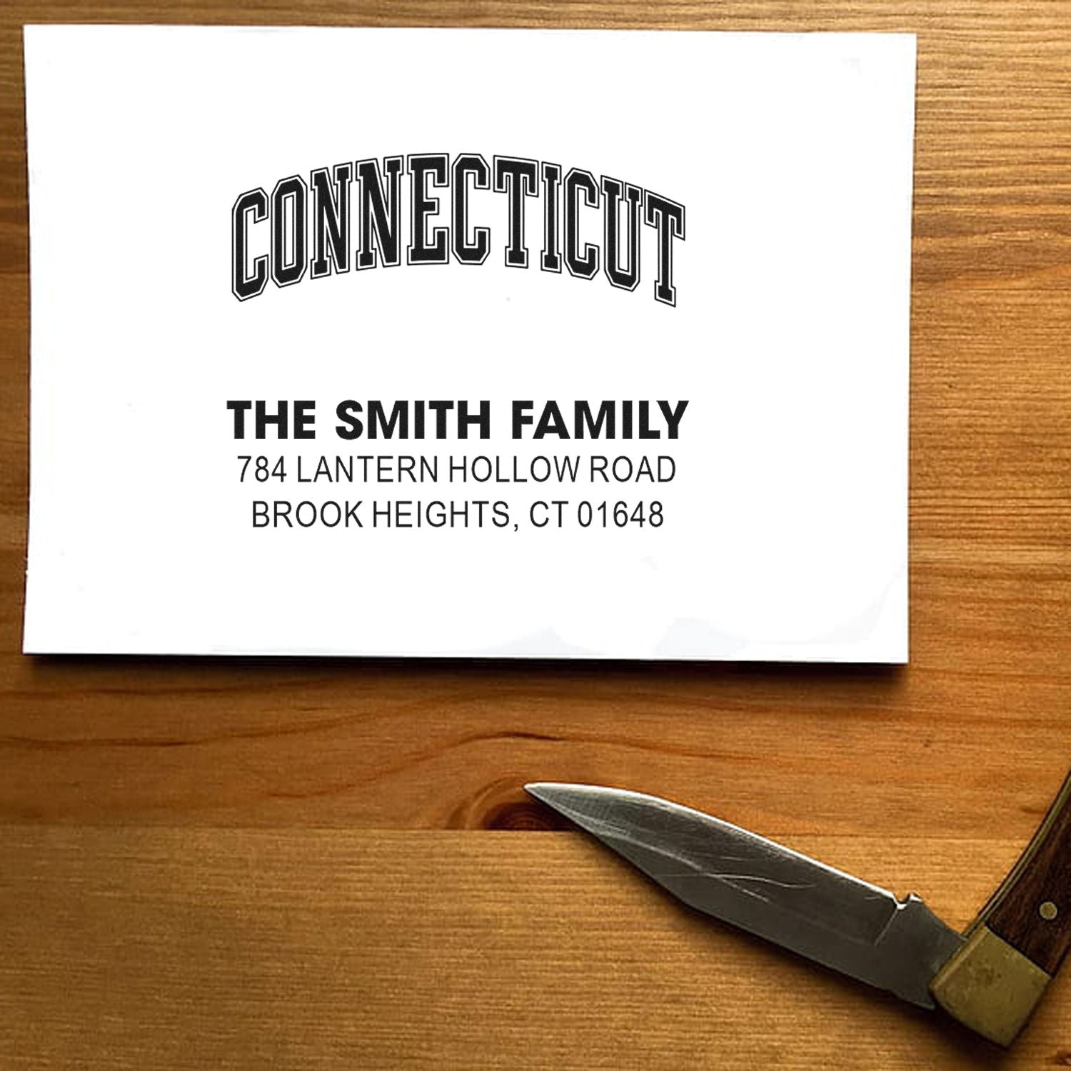 Custom Connecticut return address rubber stamp for The Smith Family with personalized name and mailing address.