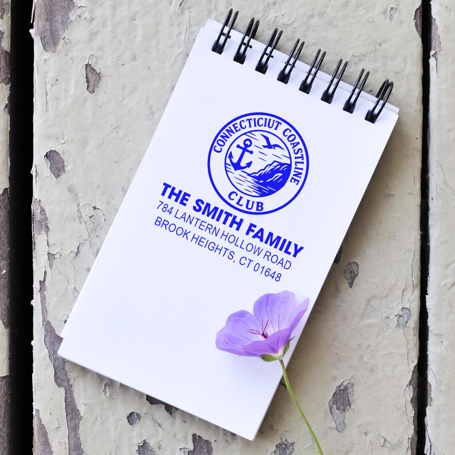 Custom address rubber stamp for The Smith Family, featuring Connecticut Coastline Club logo on a spiral notebook.