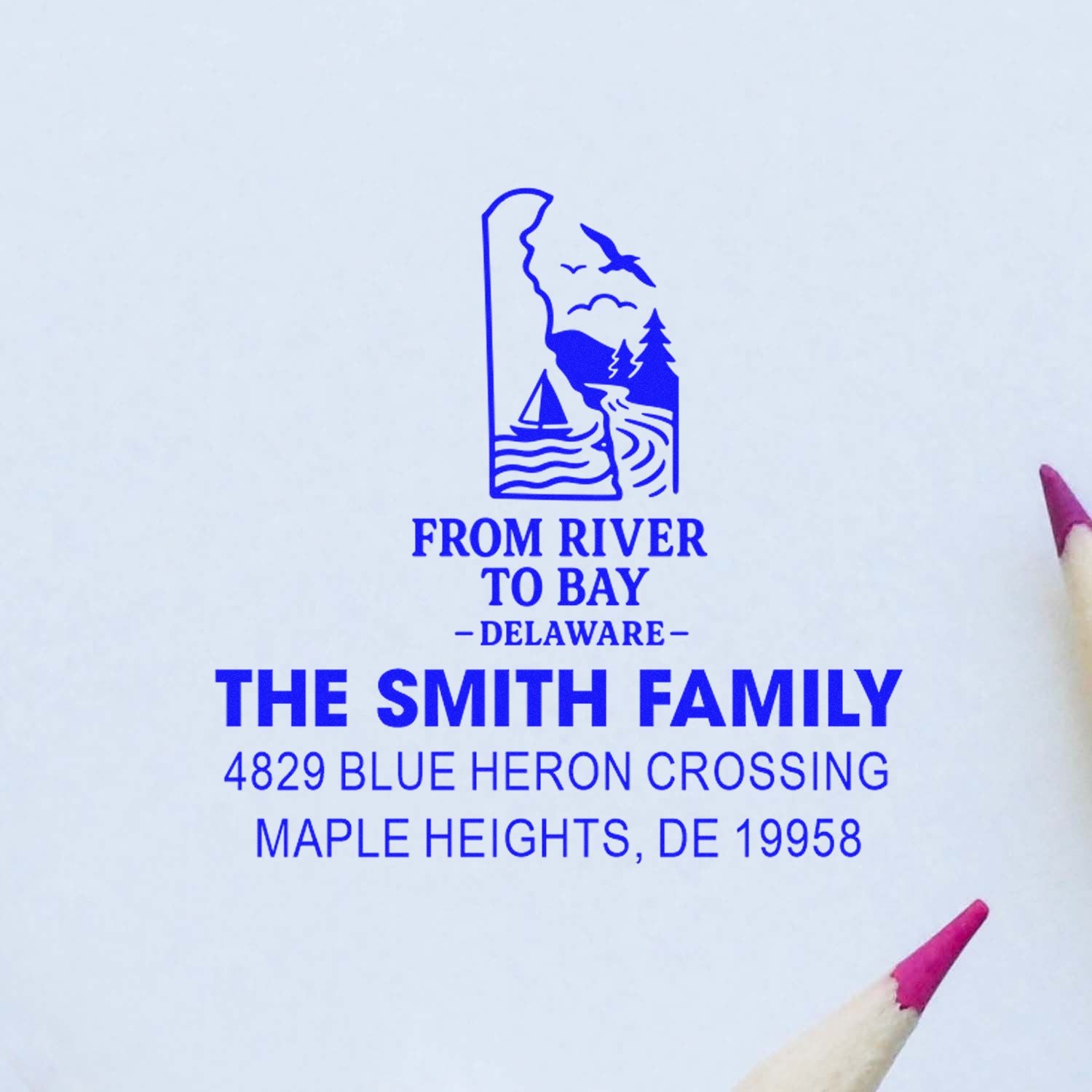 Custom address rubber stamp for The Smith Family in Maple Heights, DE, with Delaware river-to-bay scenic logo.