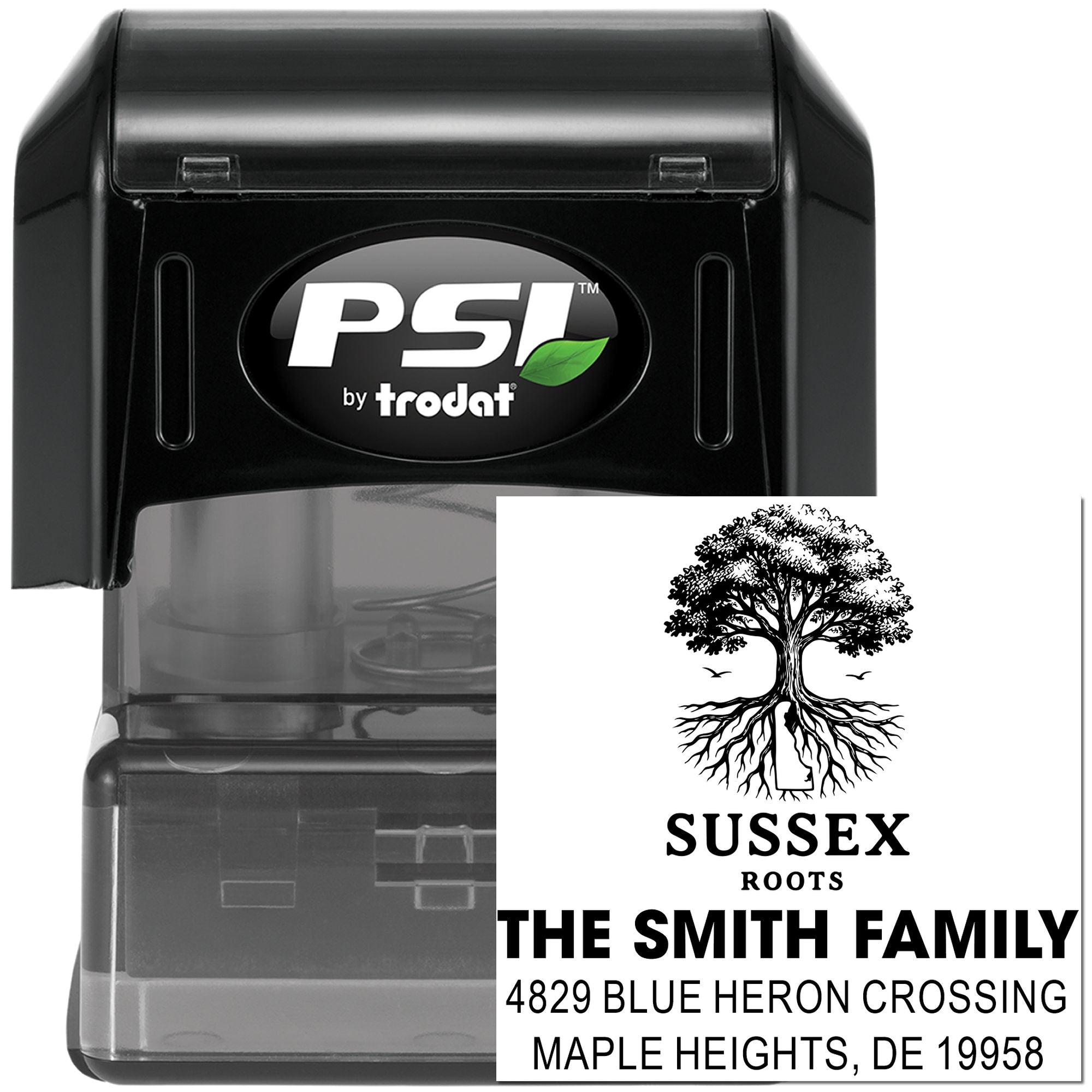 Custom self-inking rubber address stamp with tree logo, family name, and return address for mailing.