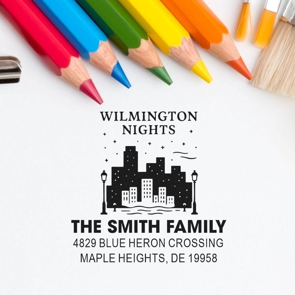 Personalized address rubber stamp for The Smith Family, Wilmington Nights skyline with return address.