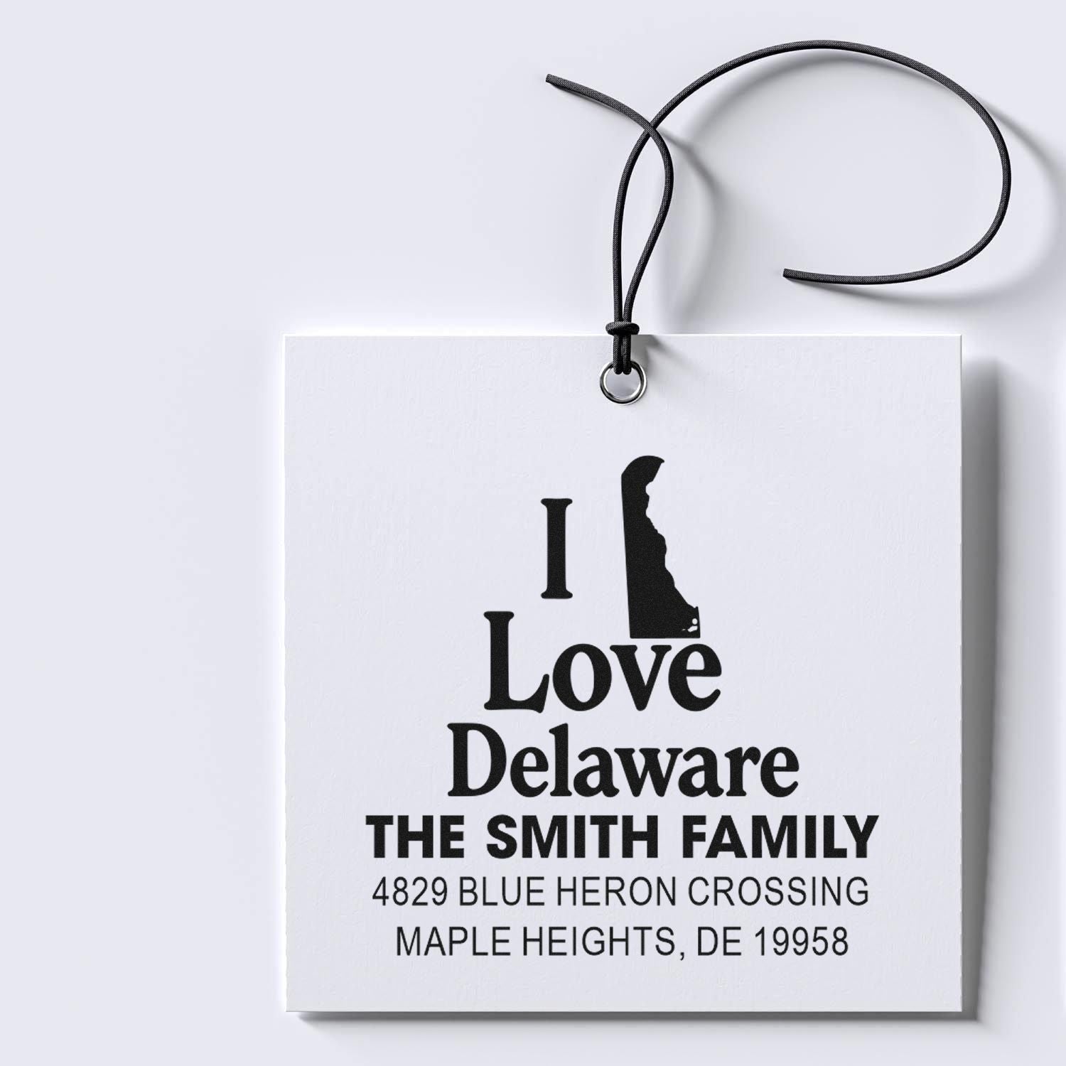 Custom Delaware return address stamp with I Love Delaware, family name, and personalized mailing address.