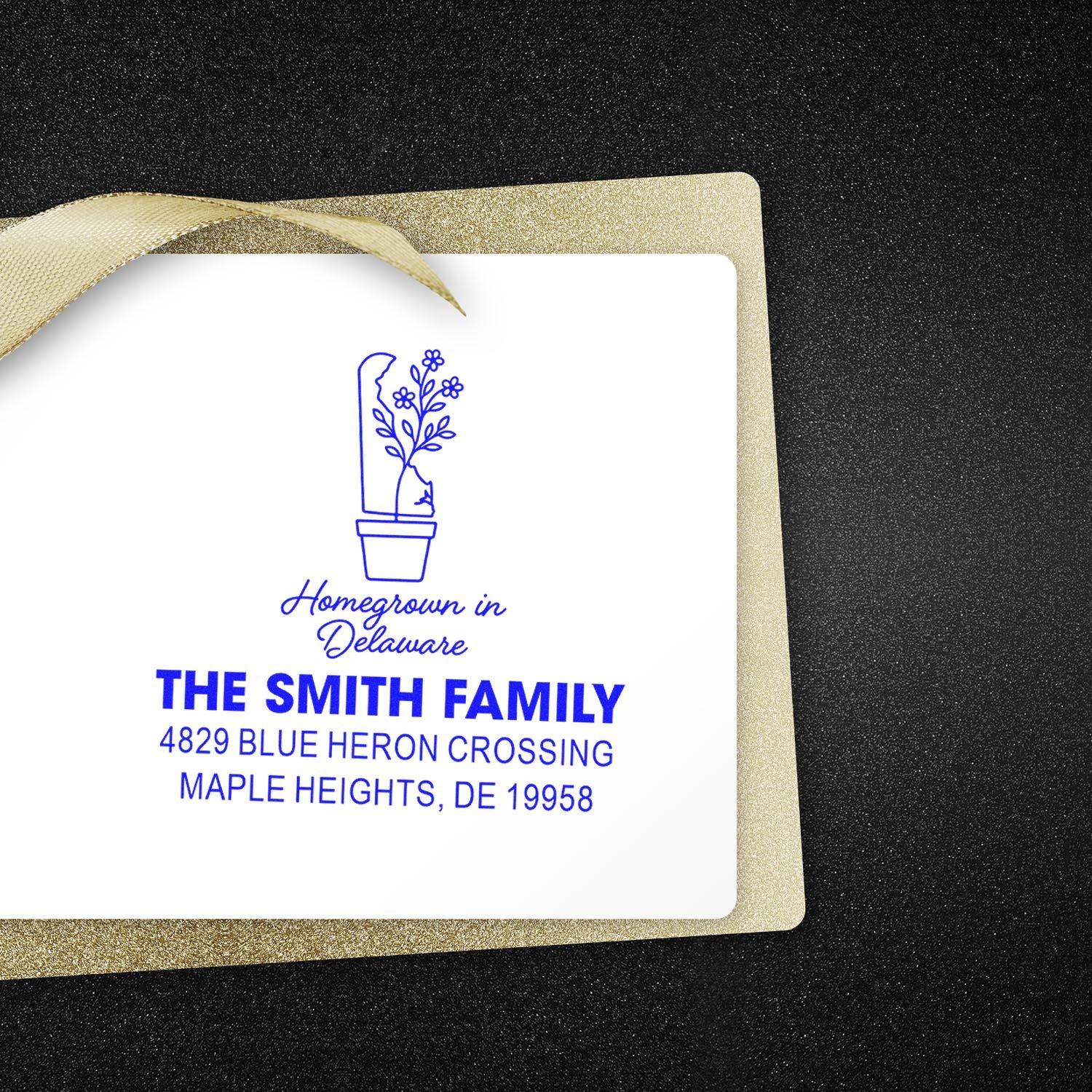 Custom return address rubber stamp for The Smith Family, with Homegrown in Delaware plant design.