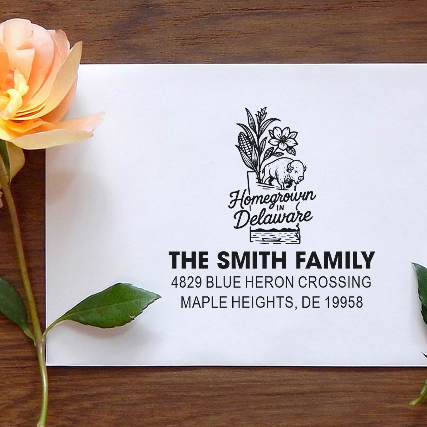 Custom return address rubber stamp for The Smith Family in Delaware, featuring farm bison, floral design, and Maple Heights address.