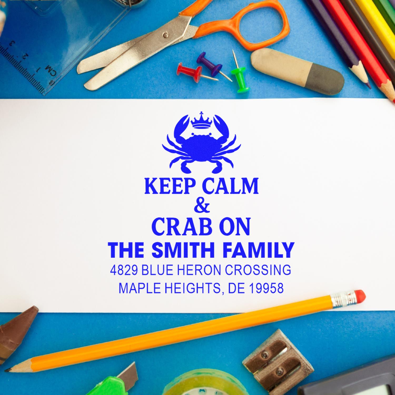 Custom rubber address stamp with crab design and family name, reading Keep Calm & Crab On for The Smith Family.