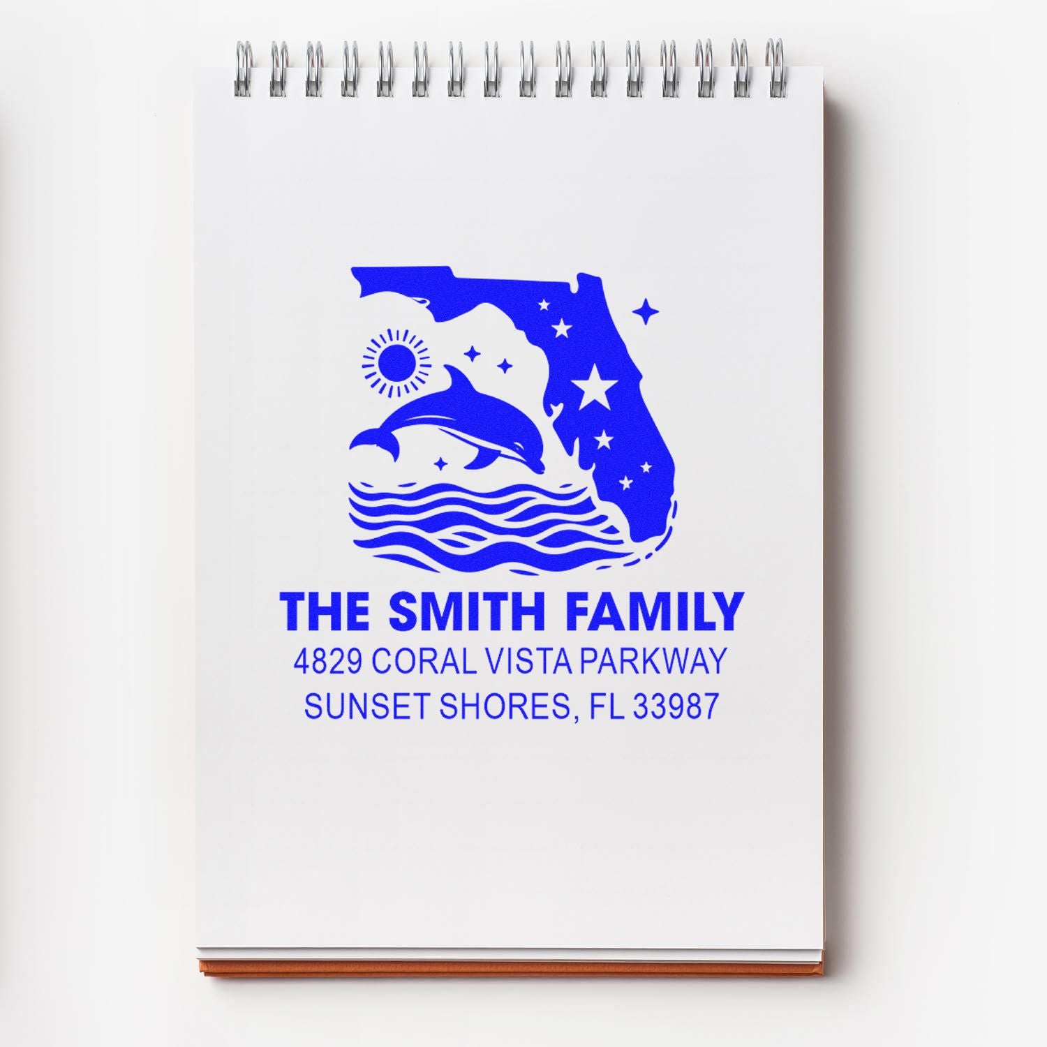 Custom Florida family address rubber stamp with dolphin, waves and stars for The Smith Family in Sunset Shores, FL.