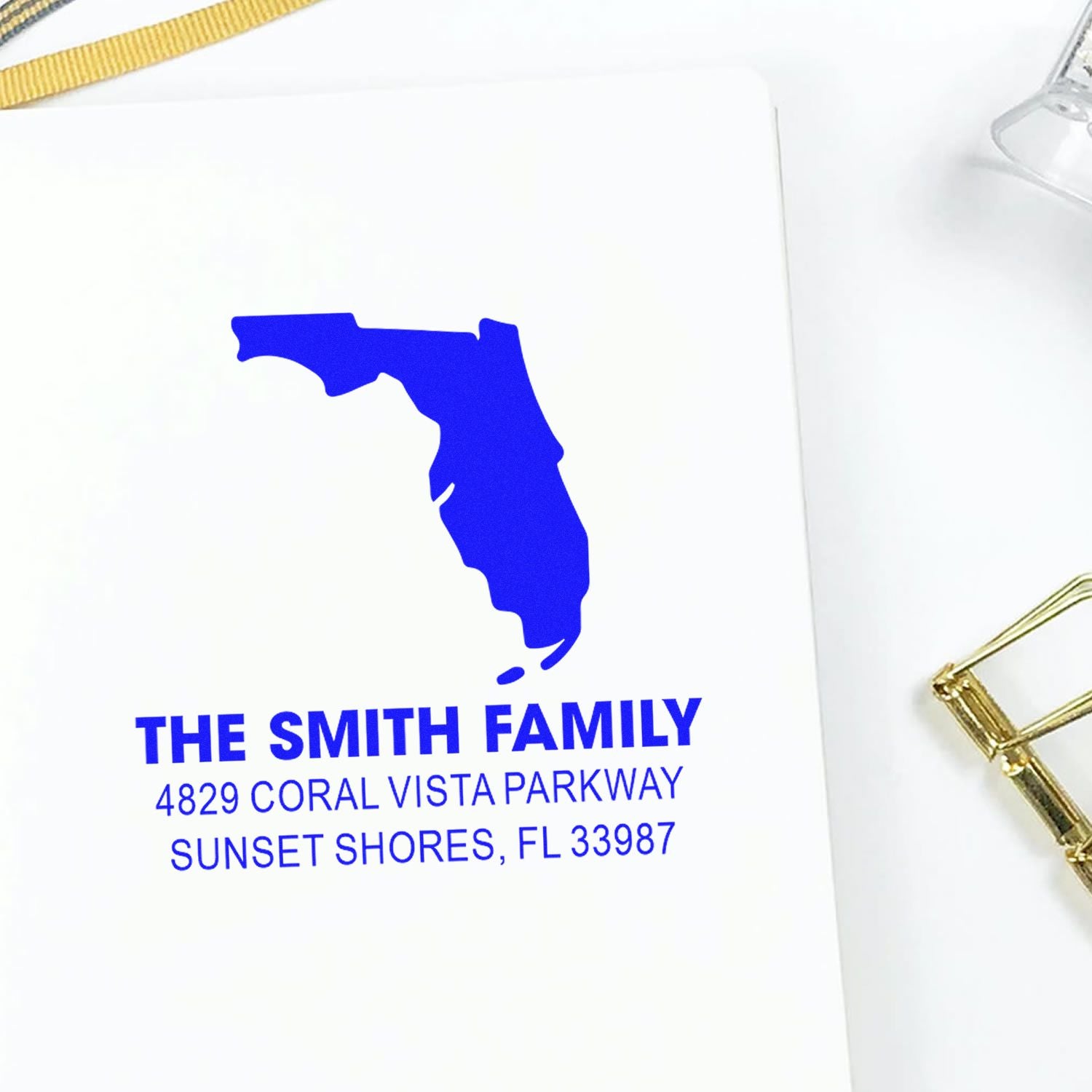 Custom return address rubber stamp for The Smith Family, featuring Florida silhouette and Sunset Shores address.