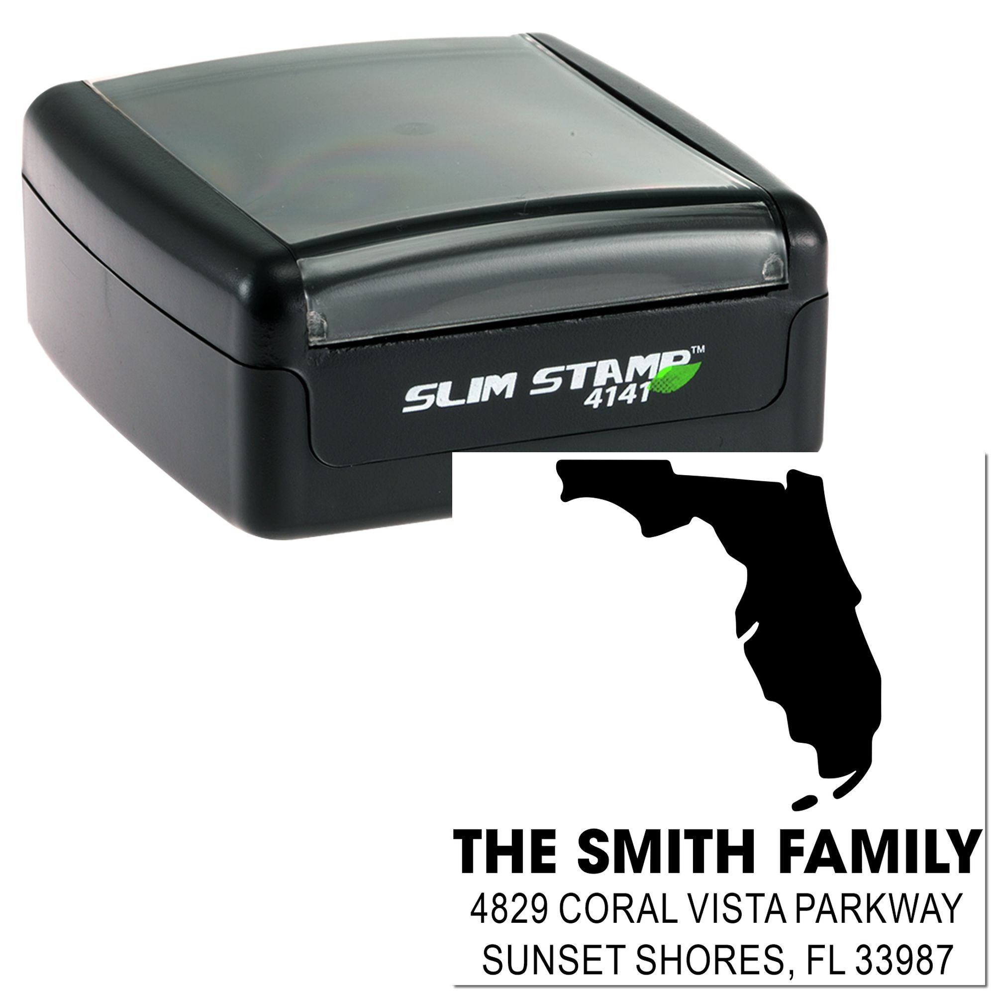 Custom Florida return address rubber stamp with The Smith Family name and address, shown in Slim Stamp 4141 case.