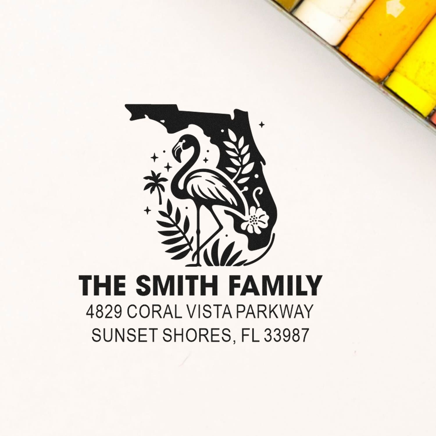 Custom rubber address stamp with flamingo design for The Smith Family, Sunset Shores, FL.