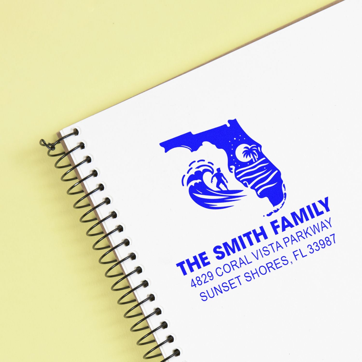 Custom rubber return address stamp for The Smith Family with Florida beach logo.