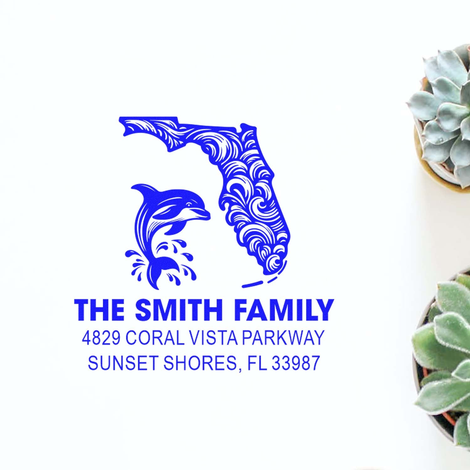 Custom Florida family address rubber stamp with dolphin design for The Smith Family, Sunset Shores, FL 33987.