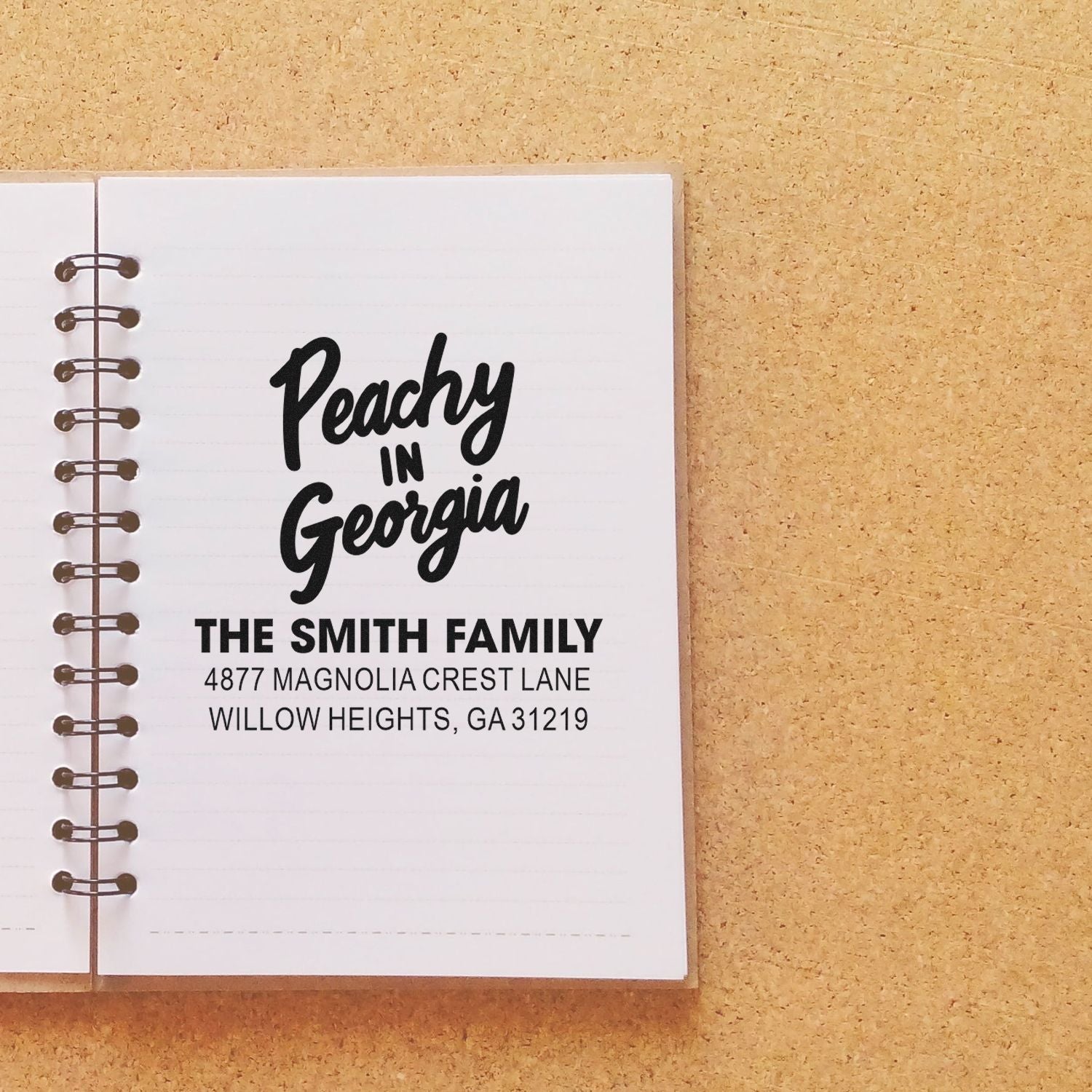 Custom Peachy in Georgia rubber stamp for personalized family address labels, stationery, and notebook branding.