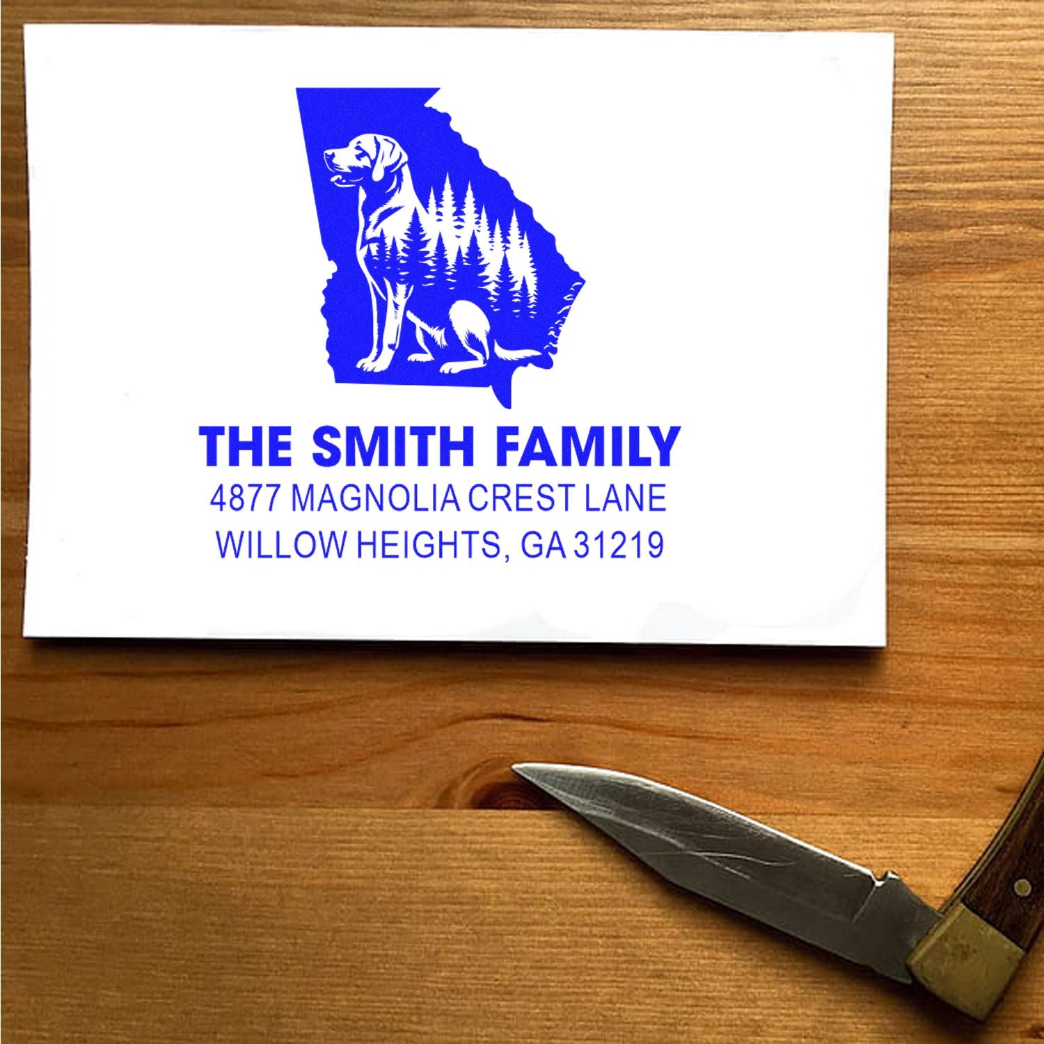 Custom rubber stamp with Georgia state dog design and return address for The Smith Family, Willow Heights, GA 31219